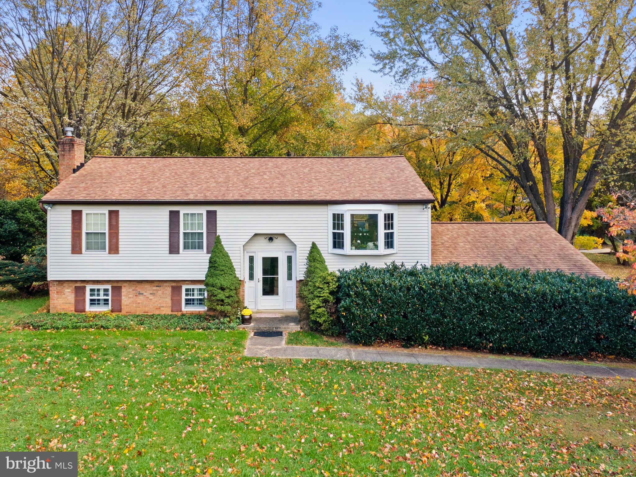 This is your OPPORTUNITY to Own a 4 Bedroom 3.25 Bath, 2 Car Garage home on a PREMIER CORNER LOT with NO HOA!  Just over 1.5 Acres in the up and coming town of Haymarket.  NEWER Roof, Windows, HVAC, Water Heater, & some appliances (less than 5 yrs old).

This family owned home has been loved and cared for over the years and now you too can make it your own and create memories for years to come!  PEACE & SERENITY come to mind as you drive onto this PRIVATE LOT filled with mature trees and open spaces.  A lovely sprawling front yard precedes the home as it sits back from the street.  The long driveway will accommodate plenty of vehicles and the 2 Car Side Load garage will be sure to provide shelter for both you, your tools, and toys!

Once inside this larger Split Foyer home you'll find upstairs the main living area, to include a SPACIOUS Living Room with bay window, REMODELED Eat-In Kitchen with stainless appliances and Breakfast/Dining table space, Primary Bedroom with dual closet and Primary Bath.  Two Additional bedrooms are just a few steps away from another full bath down the hall.

The lower level is COZY and ready for relaxing or entertaining complete with a LARGE Rec Room, Propane Gas Fireplace, 4th Bedroom and another Full Bath with Jetted Soaking Tub!  The utility and laundry areas have ample space to move around and also there is a Quarter Bath (shower) that was designed to be handicap accessible (may not be to code).

To the rear of the home is a multi tier deck, storage shed, plenty of shade, and mother nature!  Don't miss the opportunity to own your piece of the pie!  The Haymarket area is rich with shops, restaurants, and museums. Some of the county's finest schools and reasonable tax rates make this area a great place to live and settle in.  Nearby commuter access, interstates, and HOV (Hot Lanes) make getting to and from surrounding cities or work hubs easy and convenient.