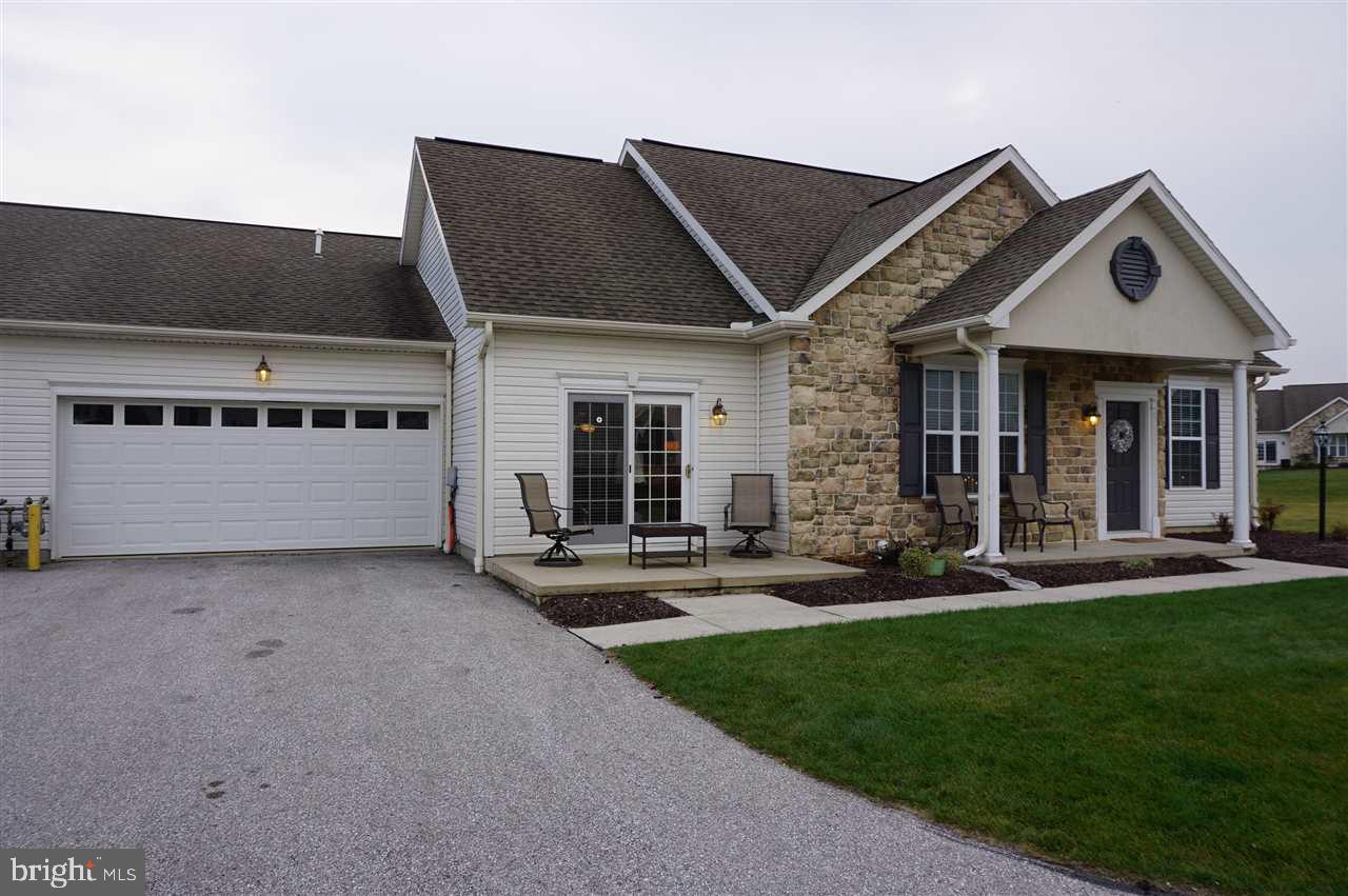 You will love this condo!  It's in excellent condition with exceptional features: cherry cabinets with slide-out shelving, beautiful granite counter and back splash, SS appliances, tap faucet, recessed lighting, upgraded vanities, and newer carpeting.  This is the one!