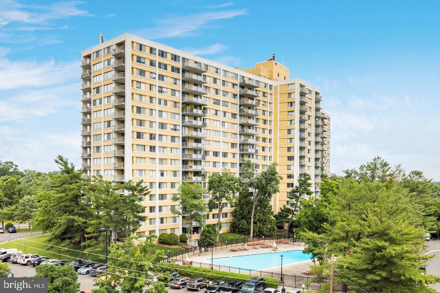 Welcome to this spacious two-level condo offering stunning panoramic views of Alexandria from every window! Step into the main level filled with natural light. The open-concept living and dining area is perfect for entertaining, with a convenient half bath nearby. The kitchen includes a gas range, microwave, and refrigerator. Enjoy indoor-outdoor living with oversized sliding glass doors leading to a large private balcony on the 12th floor—perfect for relaxing and enjoying the cityscape views. Upstairs, you'll find two generously sized bedrooms with large windows and ample closet space. The upper-level layout includes a separate entrance, providing added privacy from the main floor. This community offers a wide range of amenities including a 24-hour fitness center with sauna, outdoor basketball and tennis courts, swimming pool, picnic and grilling area, party room with full kitchen, and 24-hour front desk service. Located just over a mile from Glen Hills Park and under two miles from Pinecrest Golf Course. Convenient access to I-395, Van Dorn Metro (3 miles), public transportation, and various shopping and dining options.