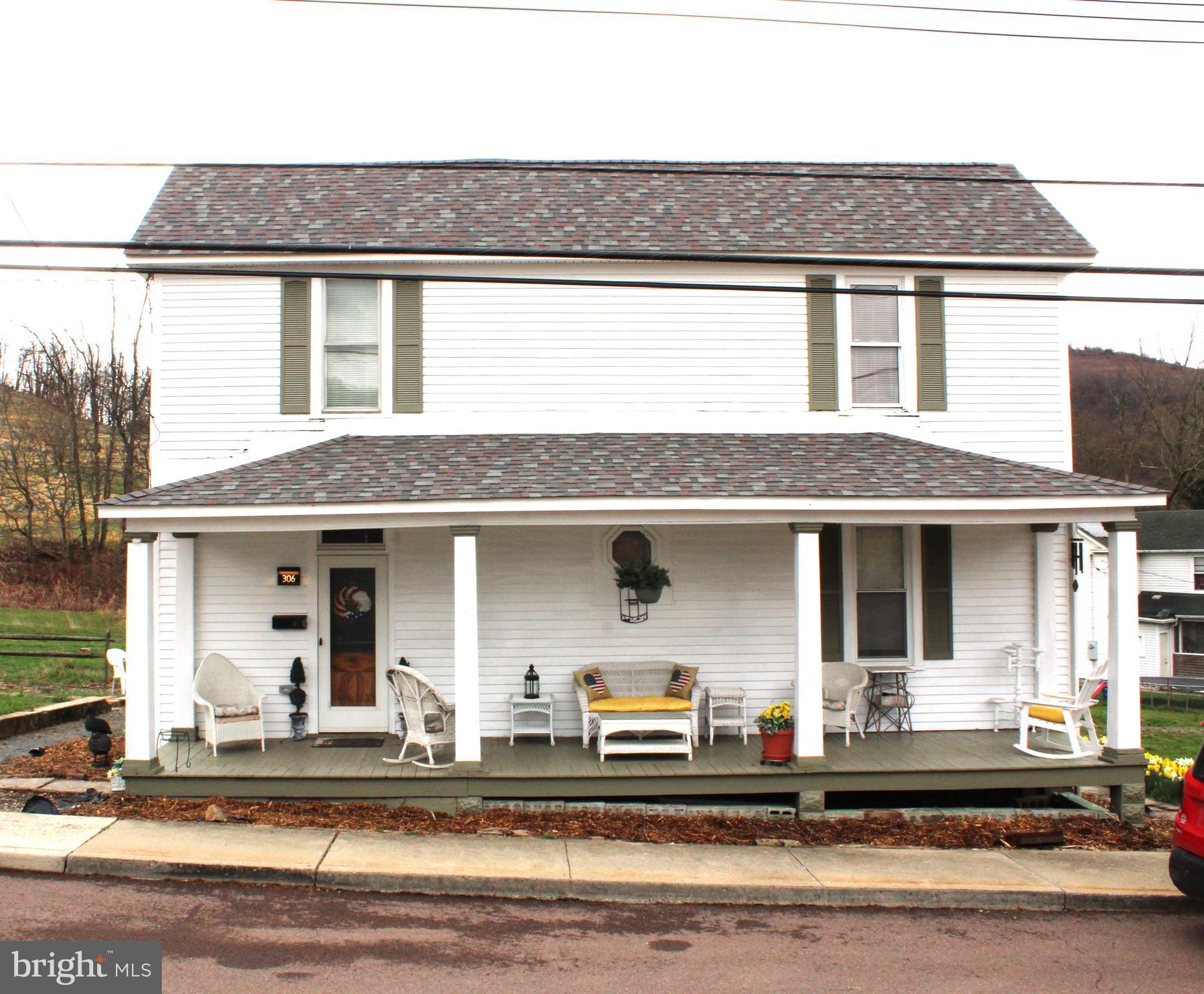 Imagine the possibilities with this cozy, large farm style home with charm and personality.  No need to build or create charm because its already built in.  Let us start with the spacious dining area with plenty of cabinets, pantry and table space.  The two living areas on the main level can be used as a playroom, office or den area, or even a fourth bedroom.  Walk up the solid  beautiful staircase to THREE large bedrooms with room for everyone.  This home was repainted on the outside late fall 2024.   Offering a NEW roof with architecture shingles.  there is a pull down stairs to access the partially floored attic, gas force air heat, a new 200 amp electrical panel box and a basement with a concrete floor.  This home can be THREE or FOUR bedrooms, 1 full bath.  This home has plenty of room to grow.  Situated on 1/3 acre corner lot, covered front porch, mountain views, plus a porch off of the kitchen area.  NEW LIGHTING and ceiling fixtures.  DO NOT MISS THIS ONE!!!!
**14 MONTH HOME WARRANTY FOR PURCHASER INCLUDED WITH SALE