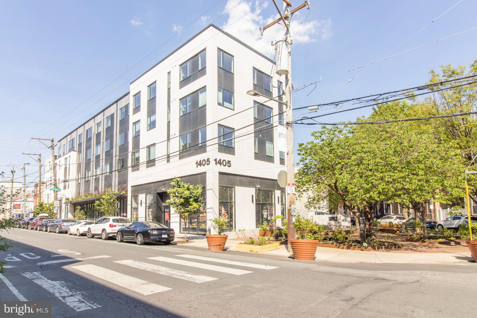 Welcome to Penn Treaty Residences, a modern and beautifully maintained condominium in the heart of Fishtown. This sun-filled 2-bedroom, 2-bath residence features rich flooring throughout, an open-concept layout, and a designer kitchen complete with quartz countertops, a spacious island, and premium GE stainless steel appliances, including double wall ovens, a cooktop, and a French-door refrigerator. Both generously sized bedrooms offer abundant natural light, while the primary suite features a private en-suite bath. Thoughtfully designed bathrooms showcase Italian tile flooring, stylish accent tile, and contemporary porcelain vanities.

Residents enjoy secure key-fob entry, elevator access, dedicated storage, a bike room, and an expansive rooftop deck with breathtaking views of Center City and the Ben Franklin Bridge. Ideally located just steps from Fishtown’s most popular restaurants, cafés, fitness studios, boutiques, and entertainment destinations, this home offers the perfect blend of modern comfort and vibrant city living, with convenient access to public transportation and major highways. An added bonus: there is still time remaining on the tax abatement.