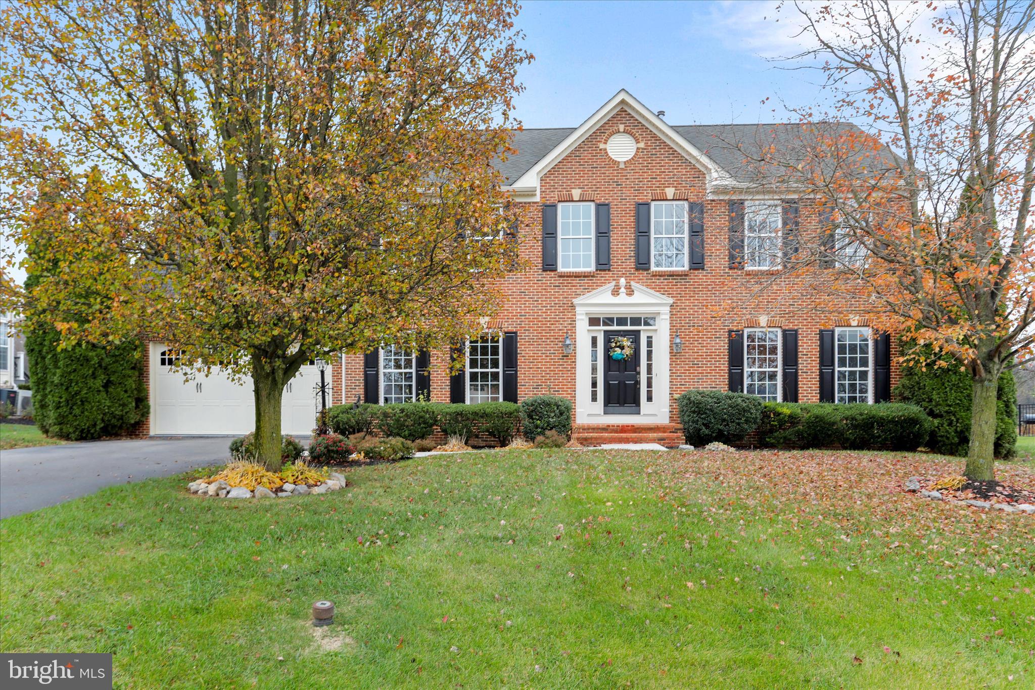Welcome to this beautifully bright & cheery well maintained 4-bedroom, 2.5-bath home with a two-car garage, located in the sought-after Elmwood Farm neighborhood. This grand stately brick front  home has a 2 story entry way foyer.   A wonderful morning room with a wall of windows for large get togethers that overlooks the  serene  back yard.   The main level consist of formal living room & office, family room with a beautiful  stone  gas fireplace for warm evening enjoyment.  A gourmet kitchen for the chef of the family with an oversized granite island, stainless steel appliances, new gas cooktop & double wall oven. Inside, the main level has  gleaming hardwood in foyer.     Oversized  laundry room  is  located on the main level.  Upstairs, you'll find four oversized  sized bedrooms and two full bathrooms. The spacious primary suite includes space for a setting area to read, and 2  large walk-in closets.   Your primary bathroom includes  a double vanity, soaking tub, separate shower.   The unfinished walkout basement  with rough in for a extra bathroom has plenty of space for a large family room, gym or workshop.  Located just minutes from Elmwood Farm Bed & Breakfast (regularly hosts community events, holiday events and a summer concert), parks, C&O towpath, Maryland Theater with  many wonderful shows, restaurants, shopping at Valley Mall or Prime Outlets .  Located near I-81 and I70 for  routes to Washington, D.C., Baltimore.  Can't find a better  price that offers a wonderful brick front, .46 of an acre, 3,192 finished sq feet  and a private backyard with  patio and lots of landscaping.  PIANO CAN CONVEY
