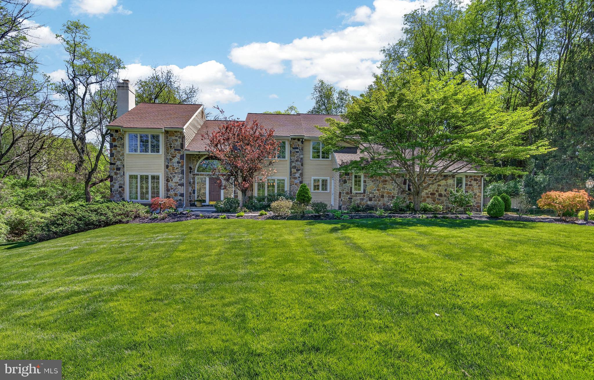 Once upon a time, tucked between the storybook charm of Kennett Square and the vibrant heart of West Chester, there was a home that feels timelessly beautiful inside and out. Welcome to 1675 Waterglen Drive.
From the moment you arrive, it’s clear this home has been lovingly and meticulously cared for, offering a pristine, move-in-ready experience where every detail shines. Sunlight pours gracefully through expansive windows, filling each room with a warm, golden glow that shifts beautifully throughout the day, creating spaces that feel both alive and serene.
Thoughtfully designed, the home offers just the right amount of space, where gathering feels natural and effortless, yet quiet corners and private retreats are always within reach. Whether hosting loved ones or enjoying a peaceful moment alone, every inch of this home feels balanced, intentional, and inviting. Step outside, and the magic continues.
The grounds and landscaping are nothing short of enchanting - lush, vibrant, and alive with the gentle soundtrack of birdsong. Meandering paths and carefully curated gardens lead to multiple outdoor entertaining spaces, each offering its own unique setting for dining, relaxing, and celebrating under open skies. It’s a place where mornings begin with coffee and chirping birds, and evenings glow with laughter and starlight.
Behind the beauty lies thoughtful efficiency. With geothermal heating and cooling, the home offers high-quality, environmentally friendly comfort. Quietly and reliably supporting every season with ease.
And while it feels like a private escape, the location is truly the best of all worlds - perfectly positioned between West Chester and Kennett Square, with seamless access to Wilmington, Delaware. Here, convenience and charm coexist effortlessly.
1675 Waterglen Drive isn’t just a home, it’s a place where everyday life feels a little more magical, a little more peaceful, and a lot more like the life you’ve been dreaming of.