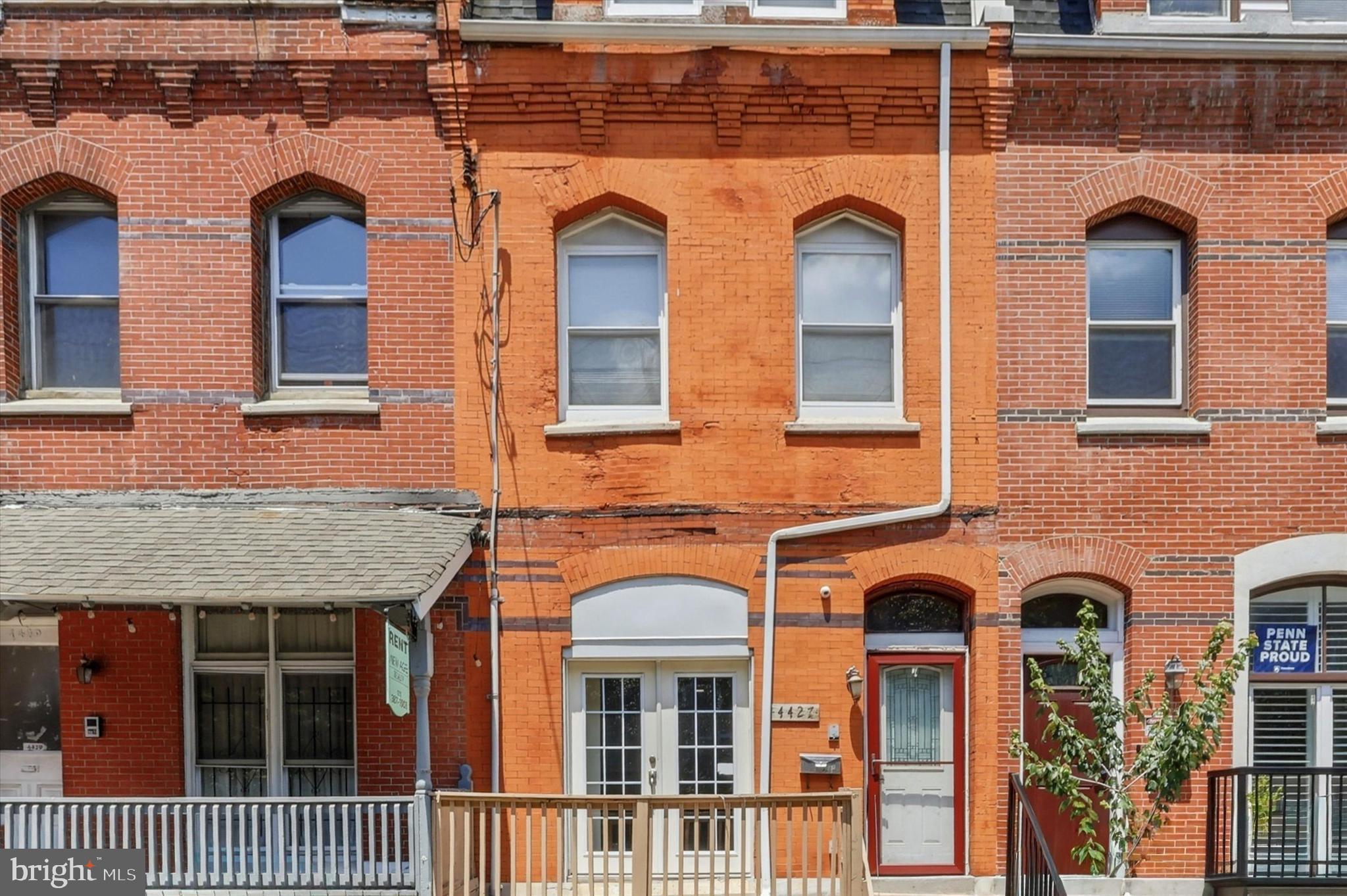 Welcome to 4427 Sansom Street, an exceptional three-story residence offering the perfect blend of timeless Philadelphia character and modern urban living in the heart of the highly sought-after Spruce Hill neighborhood of University City. Boasting over 2,200 square feet of beautifully designed living space, this spacious home features three generously sized bedrooms, three full bathrooms, one powder room, a private roof deck, and the rare convenience of off-street parking via a rear driveway.

Step inside to discover an inviting open floor plan enhanced by abundant natural light, soaring ceilings, and thoughtfully designed living and entertaining spaces. The expansive living and dining areas flow effortlessly, creating the ideal setting for hosting family and friends or enjoying everyday comfort. The well-appointed kitchen offers ample cabinetry, generous counter space, and easy access to the outdoor living areas.

The upper levels provide exceptional privacy with spacious bedrooms and well-appointed bathrooms throughout. The luxurious primary suite serves as a peaceful retreat, complete with an en-suite bathroom and generous closet space. Additional bedrooms offer flexibility for guests, a home office, or growing families.

One of the home's most impressive features is the private rooftop deck—a spectacular outdoor oasis perfect for entertaining, relaxing, or taking in breathtaking skyline views while enjoying warm summer evenings or your morning coffee. Whether hosting gatherings or unwinding after a long day, this elevated outdoor space extends your living area and offers a true city-living experience.

Adding to the home's rarity is the private rear driveway, providing valuable off-street parking—an incredible convenience in one of Philadelphia's most desirable neighborhoods.

Perfectly situated in the vibrant University City community, this home is just moments from the University of Pennsylvania, Drexel University, CHOP, Penn Medicine, neighborhood parks, award-winning restaurants, cafés, shopping, cultural attractions, and convenient public transportation, with easy access to Center City and major highways.

Offering an exceptional combination of location, space, outdoor living, and private parking, 4427 Sansom Street presents a rare opportunity to own a remarkable home in one of Philadelphia's premier neighborhoods. Schedule your private showing today and experience everything this outstanding property has to offer.