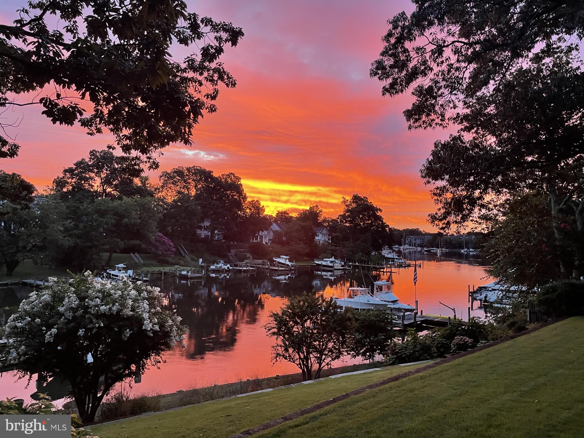 Extremely well-maintained waterfront home on .669 acres. Annapolis WATER TAXI service is available to this meticulously home with 115ft on prestigious Spa Creek. Spa Creek channel dredged for 5.6-foot draft with private pier, 3+slips at 6-foot depth & floating kayak dock and ramp. Two, 20k pound boat lifts and one 3k pound boat lift.  New pier was installed in 2023. Peruvian tigerwood flooring on entire main level of home. Large 4 season sunroom with heated ceramic floors. Brazilian teak flooring on entire upper level of home. Great entertaining home with 2 social areas with blue slate stone patios with fire pit, granite bar with built in propane grill as well a small kitchen off sunroom. 2 Geothermal units. Large master bedroom with walk in closet, sunroom off bedroom. Office on main level can be another bedroom. Great Attic storage. Recessed lights, ceramic tile, plantation shutters, multiple skylights and rare marble windowsills in home.  One of the bedrooms has cathedral ceilings with a loft.  Large mudroom with washer /dryer with ceramic tile. Home is beautifully situated among established trees, manicured landscaping with fenced in property as well water irrigation to 75% of yard.   LOT can be subdivided. Easy access to Route 50 and I-97.  Minutes away from downtown Annapolis, restaurants, bar, banks and shopping centers. A must see to believe.  Set up a showing!