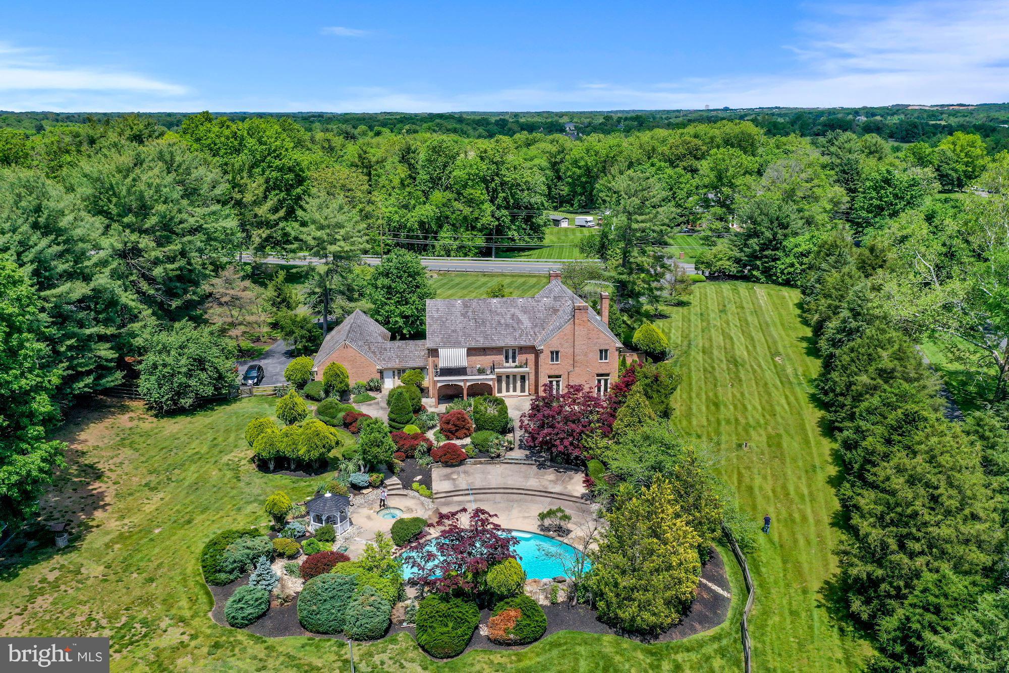 Beautiful 3+ acre lot at the entrance of Merry Go Round Farm!  House needs extensive updating and renovation.  Recently updated Swimming Pool with Water Falls.  Generator.  Finished Lower Level.  House sold only in AS IS condition.