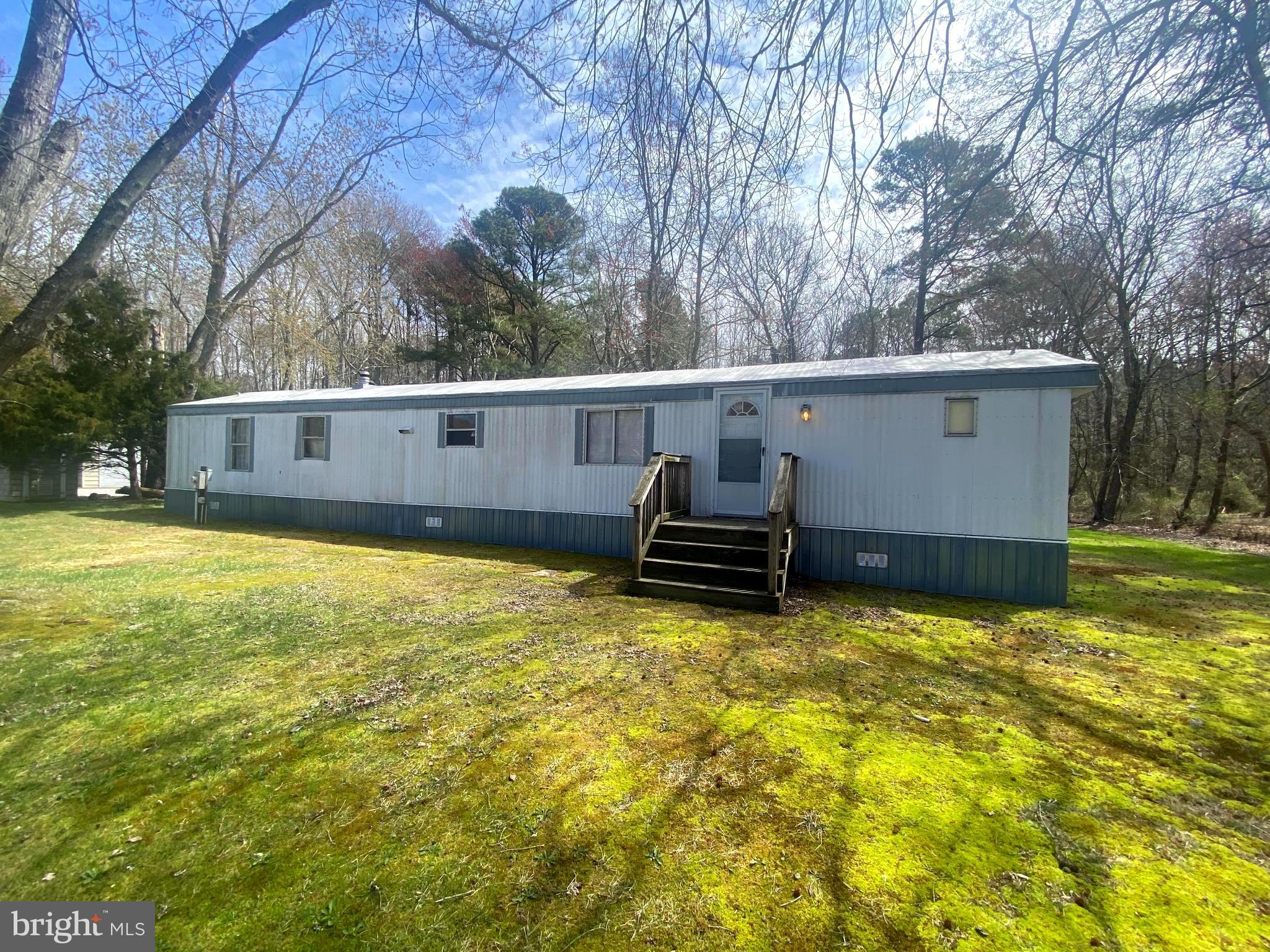 This beautiful 5 acre property sits in a rural setting allowing for hunting, fishing,  crabbing, camping, boating and so much more ! There are wild turkey, deer and maybe some  Sika.  There is a large out building for storage and a boat or RV carport, additional shed and well pump house.  Over an acre of cleared land and partially wooded.  If you are looking for peace and quiet, this is it. There are 3 public marinas within 10 minutes.  Bring your boat and drop in on the Nanticoke River and grab a bushel of crabs while you are there.  Enjoy the local restaurant Boonies and Red Roost and treat yourself to Eastern Shore cuisine in a relaxing environment.  ** Property being sold "As Is" **