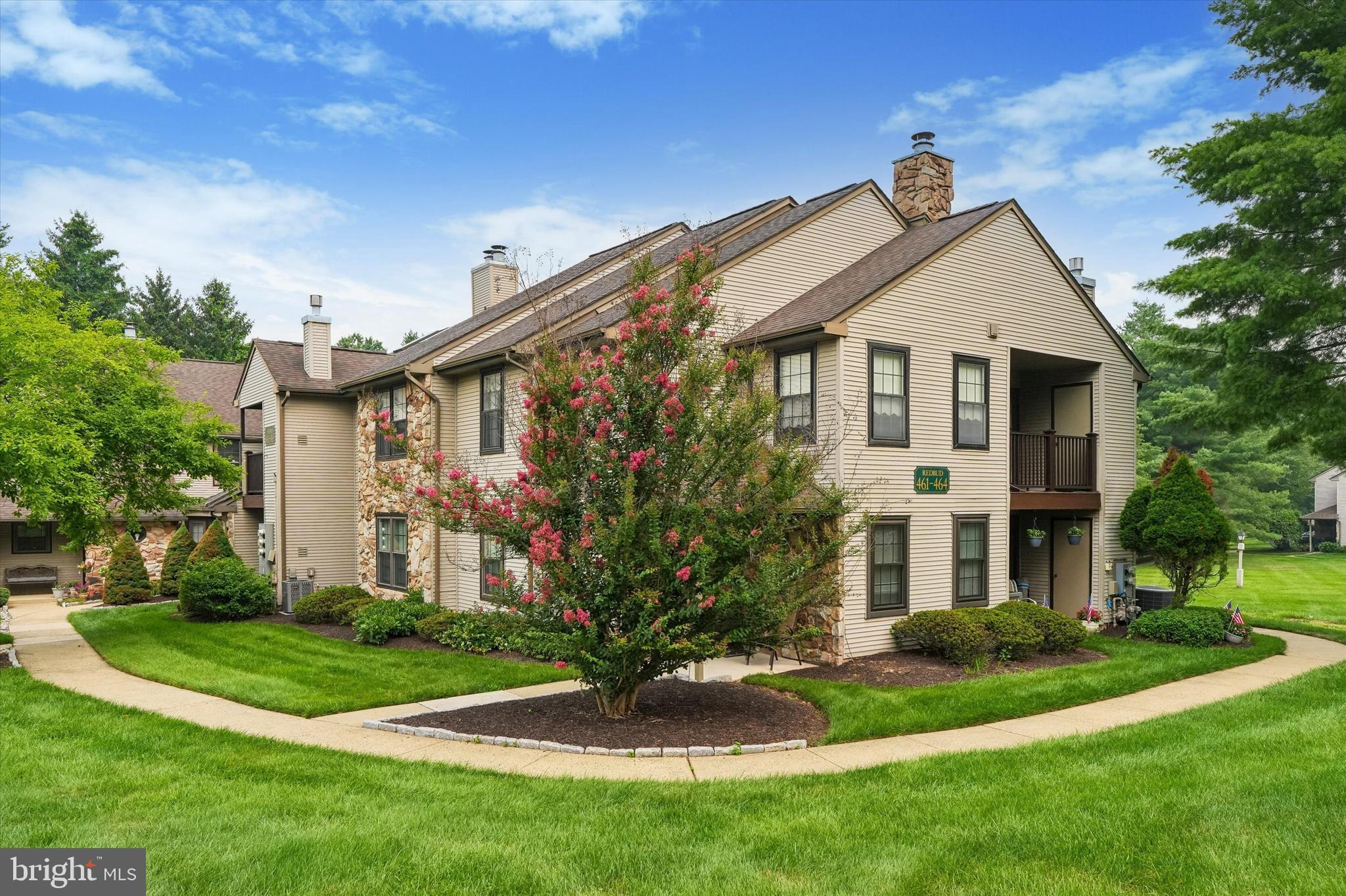 Welcome to this maintained second-floor condominium offering 2 bedrooms, 2 full baths, and an inviting open floor plan filled with natural light. The dramatic cathedral ceilings create a spacious feel throughout the large living room, where sliding glass doors lead to a private patio—perfect for enjoying your morning coffee or relaxing at the end of the day.
The generously sized dining room also features sliding doors to the patio, making indoor-outdoor entertaining a breeze. The kitchen offers classic oak cabinetry, a newer dishwasher, electric cooking and a pantry closet. 
The sunny primary suite is a peaceful retreat with a large walk-in closet and a private en-suite bath featuring a walk-in shower. The second bedroom is generously sized and also includes an oversized walk-in closet, while the neutral hall bath offers a convenient tub/shower combination.
Located in the highly regarded Central Bucks School District, this home combines comfortable living with an unbeatable location. Just minutes from Target, Whole Foods, Wegmans, Chick-fil-A, Regal Cinemas, and an abundance of shopping, dining, and everyday conveniences, you'll enjoy easy access to everything Warrington has to offer. With major roadways nearby, commuting throughout Bucks and Montgomery Counties is simple and convenient.