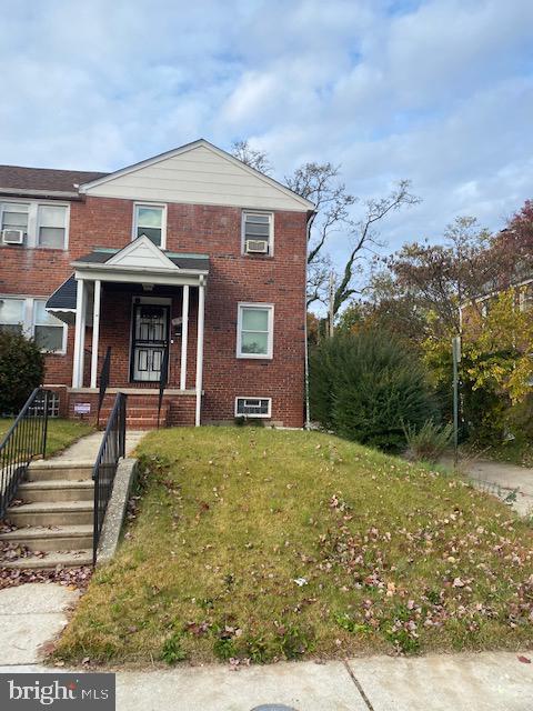 Bring your paint brush and creativity to this spacious 3 bedroom 1.5 bathroom end of group townhome in the Mid-Govans community.  Hardwood floors through out home.  Lower level includes a family room and plenty of storage space in the unfinished portion of the basement. Fully fenced in backyard perfect for entertaining. Conveniently located minutes to Towson, Notre Dame of Maryland University, Morgan State University and shopping centers.
