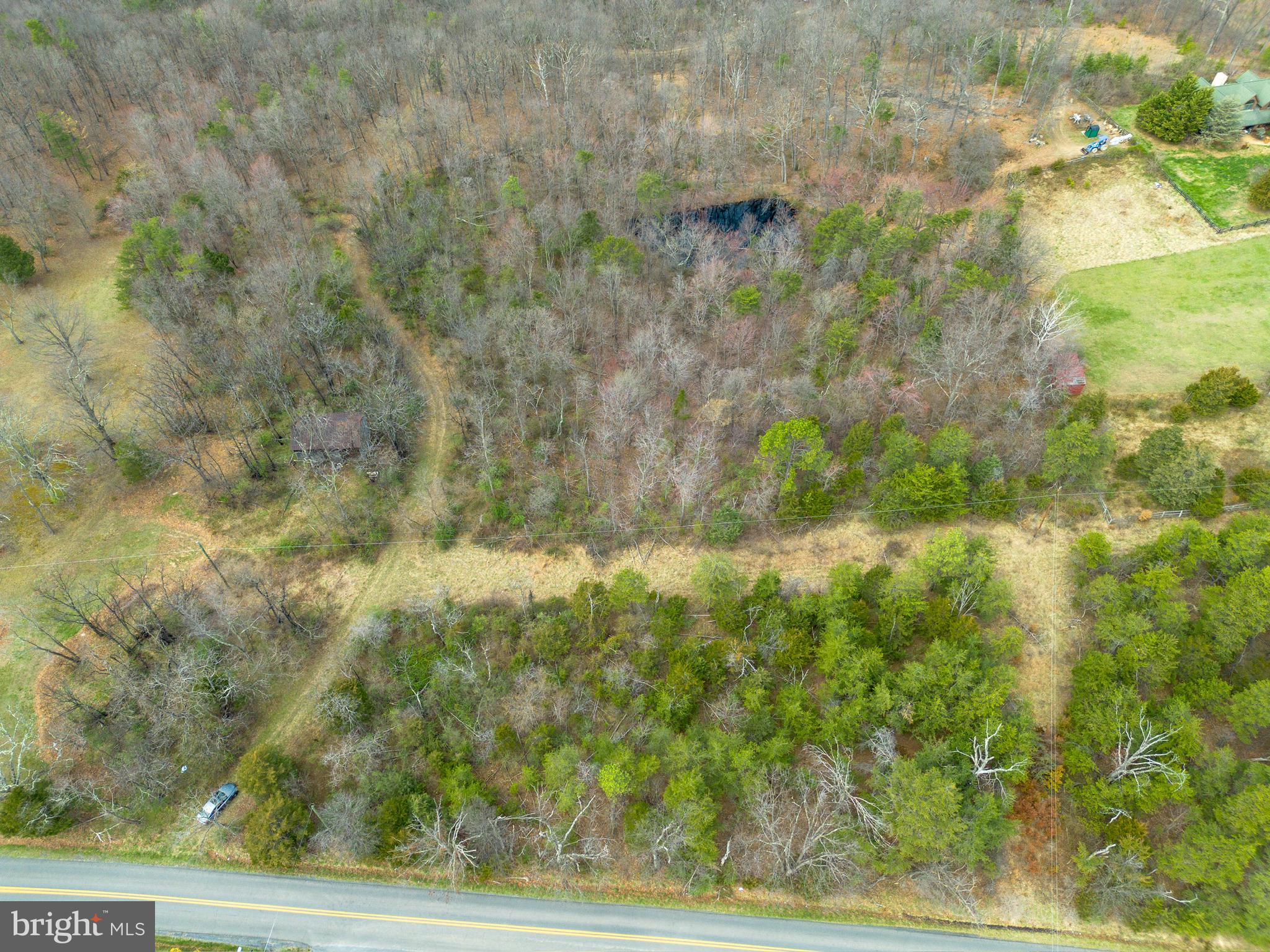 If you’ve been searching for space to breathe, this is it.
Spanning 140.54 acres of wide-open and wooded land, this incredible property on Wardensville Grade offers the kind of peace, privacy, and freedom that’s getting harder to find. The moment you step onto the land, you’ll feel it, room to breathe, space to roam, and endless possibilities in every direction.
There’s a beautiful homesite just waiting for you, perfectly positioned to overlook a peaceful pond. Imagine your future front porch here-morning coffee with mountain air, evenings filled with quiet sunsets, and nothing but the sounds of nature around you.
Whether you’re looking to build your dream home, create a family compound, or design the ultimate weekend retreat, this land gives you the flexibility to do it your way. With NO HOA and NO restrictions, you have the freedom to build, farm, hunt, ride UTVs and four-wheelers, or even create your own private shooting range. No one telling you what to do, just land that works for your vision.
Spend your days exploring your own trails, watching wildlife, or simply unplugging from the noise of everyday life. With a mix of open fields and wooded acreage, you get both stunning views and natural privacy, ideal for a homestead, hunting property, or long-term investment.
And while it feels like a true getaway, you’re still conveniently located within reach of Winchester and major routes like 522, I-81, and I-66, making commuting or weekend trips easy.
This is more than just land, it’s a chance to build something lasting. A place to gather, grow, and create a legacy for generations to come.
Big land. Big sky. Endless potential.