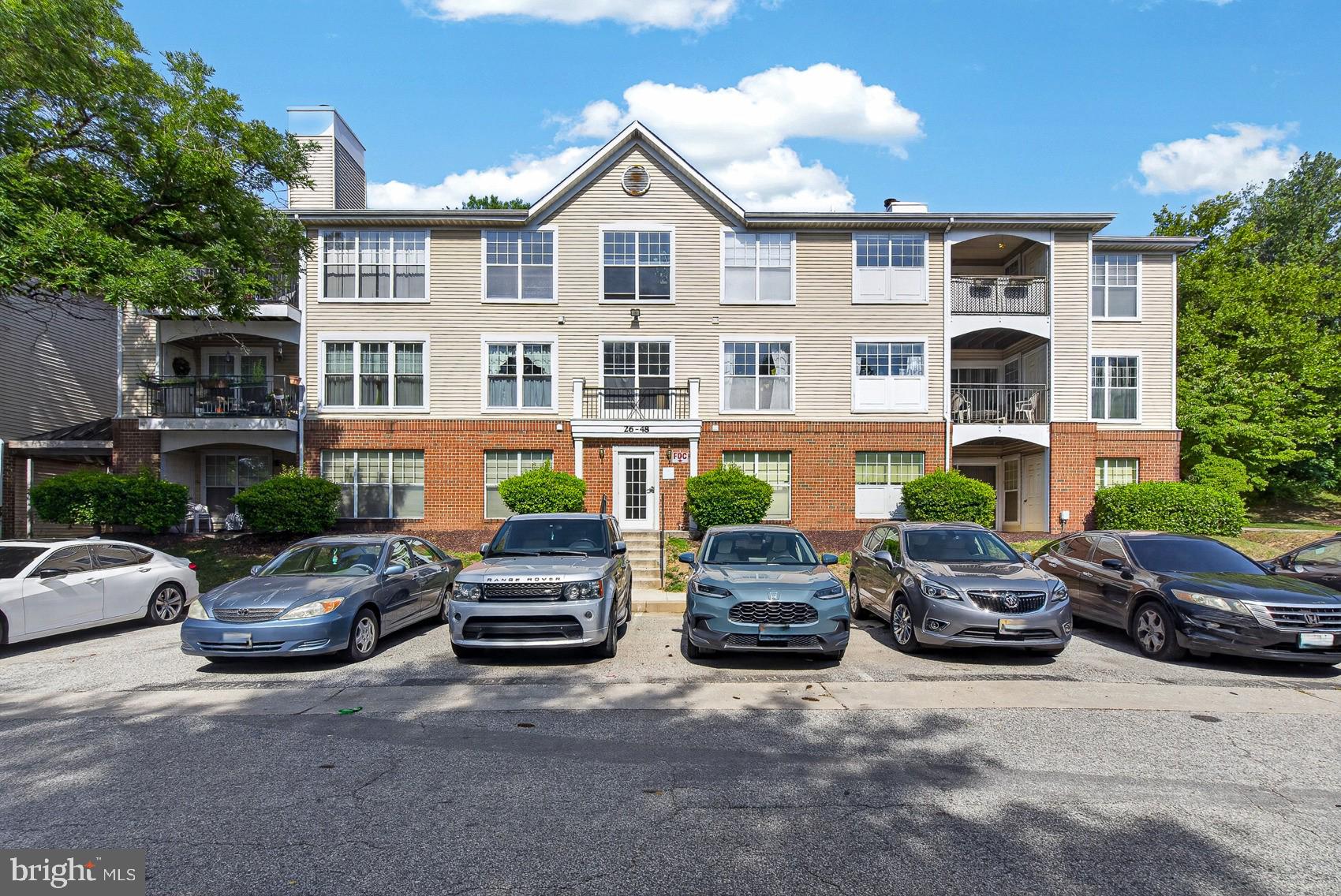 Priced to sell, this 2 bedroom, 2 bath condo in Parkville won't last long! This home features a spacious living room centered around a cozy fireplace, a separate dining room perfect for entertaining, and a sun-filled kitchen with beautiful natural light. Step outside to your private balcony, ideal for morning coffee or evening relaxation. The primary suite offers a generous walk-in closet and an en-suite bath complete with convenient in-unit laundry. Freshly painted walls and a few cosmetic updates are all this condo needs to shine. Being sold strictly as-is. Whether you're a first-time buyer, downsizer, or investor, this Parkville condo offers comfort, convenience, and upside potential. Don't miss this affordable opportunity in Baltimore County.
