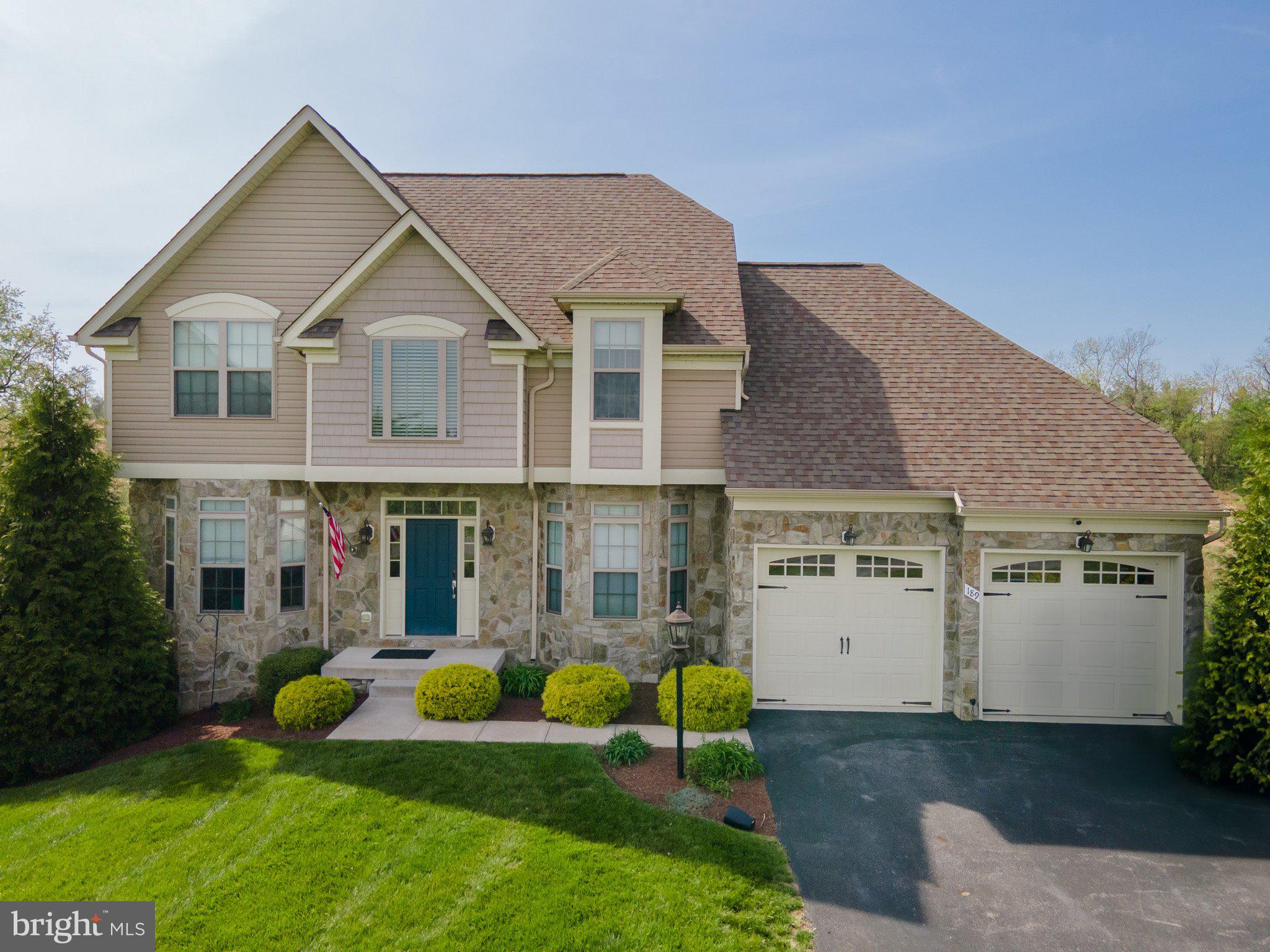 Congratulations! you’ve discovered a home that offers the perfect blend of comfort, convenience, and elegance. This stunning 5-bedroom, 3.5-bath home is nestled in the sought after, gated community of Beallair in Charles Town, WV.  Built in 2016, a traditional-style home that exudes curb appeal and sophistication; read along to discover the captivating features of this stunning home. Step into an inviting, open foyer to be greeted by hardwood floors that seamlessly flow through the main level of the home. The inviting gathering room is the heart of the home with vaulted ceilings, windows that invite in natural light and a cozy pellet stove with raised hearth that's perfect for creating warm memories. The gourmet kitchen is a chef’s dream, showcasing rich cherry cabinetry, granite countertops, gas cooktop, double wall ovens, a center island  with sink and breakfast bar making it ideal for both everyday living and entertaining. For more formal meals and gatherings the separate dining room is perfect with its arched doorways, crown moldings and chair-rail. The main-level primary suite creates a private sanctuary with its spa-inspired bath featuring a soaking tub, dual vanities, and a walk-in shower. Built-in bookcases and work space create a functional home office making work and study a delight. The main floor laundry adds to the home's functionality making daily chores a breeze. On the upper level 2 generously sized bedrooms provide comfort and privacy.  The fully finished lower level is ideal for recreation, entertainment and relaxation. Use the 2 oversized bedrooms as bedrooms or be creative and create a home gym, home theatre or maybe even a craft room, the possibilities are endless. Imagine ending your work-out or long day with a sauna session in the custom built in sauna. Have guests over to enjoy the sauna, they can use the sauna dressing room with built-in safe. Imagine enjoying your morning coffee on the screened porch or hosting gatherings on the expansive deck, all while surrounded by beautiful landscaping and a spacious rear yard. This home is not just about aesthetics; it’s designed for efficiency and comfort. Parking is a breeze with an attached two-car garage and a paved driveway, ensuring ample space for vehicles and guests. The rural location offers a tranquil lifestyle while still being conveniently close to local amenities, making it an ideal choice for those seeking a balance between seclusion and accessibility. This property is more than just a house; it’s a place where memories are made, and dreams are realized. Don’t miss the opportunity to make this exquisite home your own. Schedule a viewing today and experience the charm and elegance that awaits!