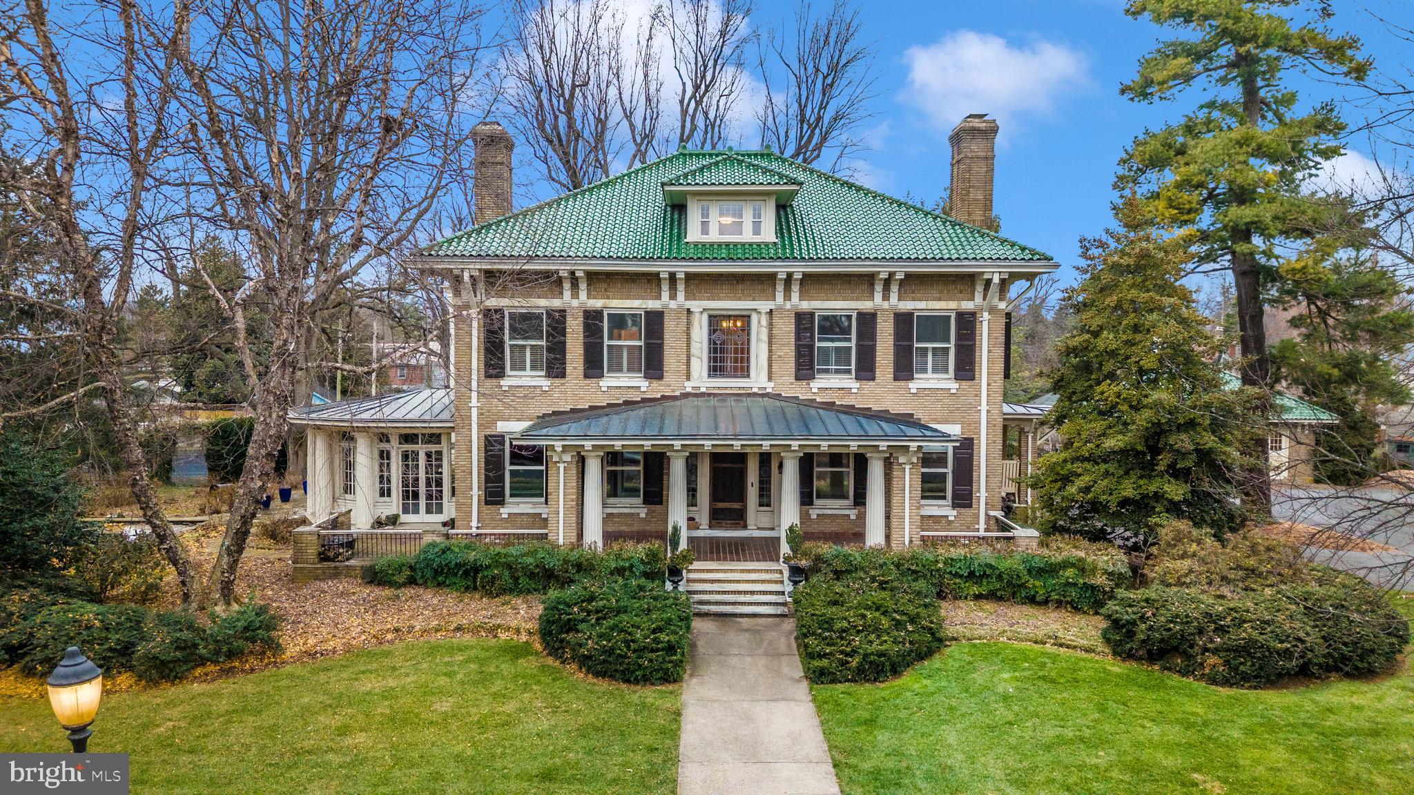 ***BACK ON THE MARKET***REPRICED TO MARKET***SELLER FINANCING POTENTIAL***Baker Park grandeur on a quad sized lot – Indulge in over 6,000 SF of living space in this circa 1917 brick & marble Italian estate nestled on over 1 acre on one of the most desirable streets in the premier neighborhood of Frederick.      

Charming four level brick & marble home in downtown Frederick in the established tree lined neighborhood of Baker Park.  307 Upper College Terrace enjoys a fantastic location within close proximity to Baker Park, Culler Lake, Hood College and everything downtown Frederick has to offer.  Over $800,000 in upgrades to home and grounds since purchased.

Featuring a traditional lay-out with modern finishes, the main level enjoys high ceilings, hardwood floors, pocket doors, an oversized formal living room with fireplace, oversized formal dining room and study, sun room, two half-bathrooms and a bright oversized eat-in gourmet kitchen with an abundance of natural light.  Walk out of the kitchen to a stone patio perfect for BBQing and enjoy the grounds on this oversized quad lot.  (Parcel is 1.1± ac, originally 4 city lots).  The grounds feature many mature trees, a tennis court, and stone pond with fountain, adding to the tranquility of this estate.  The former detached garage has been converted into an open and finished space perfect for recreation or entertaining. 

The second floor of the home features the master suite & sitting room, featuring an en-suite luxury bathroom with soaking tub and a glass enclosed walk-in shower.  The master suite also features a balcony with relaxing views, ceiling fans, laundry chute, and ample closet space.  Rounding out the second floor are multiple additional bedrooms, an additional renovated hall bathroom with dual sinks & glass enclosed shower, and an easily accessible second floor laundry room equipped with a utility sink and washer and dryer, and additional access to the second floor balcony.

The upper level boasts of an oversized rooftop terrace with expansive city views, including the St. John’s bell tower.  The remainder of the upper level has been updated as a suite consisting of a large open room with dormer windows, an expansive walk-in cedar closet, and renovated bathroom.  The basement is partially finished with a recreation room / office, large storage room, additional laundry room, storage area, and mechanicals.

Private showings by appointment, contact listing agent for more details.