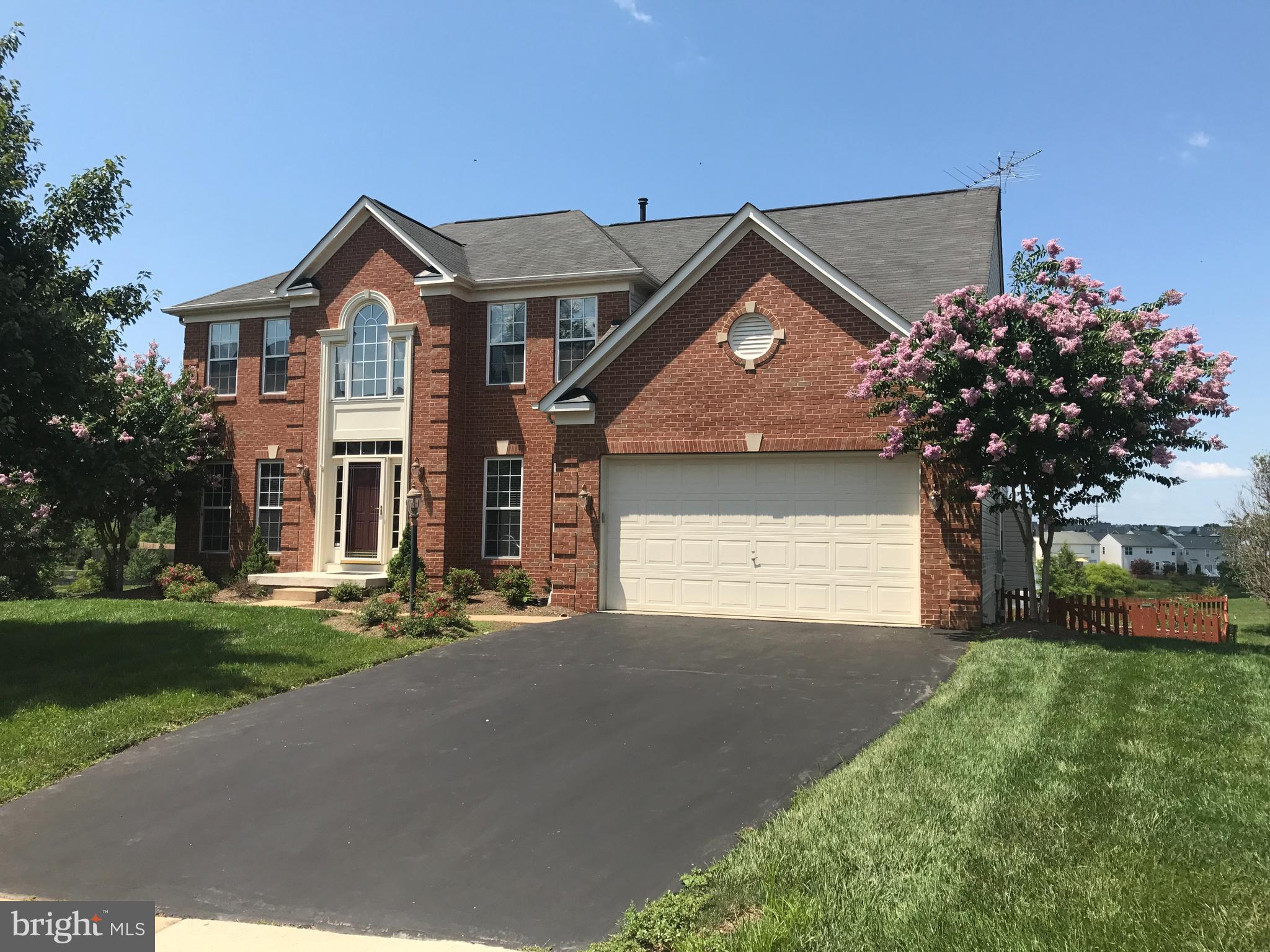 Don't miss your opportunity to purchase this beautiful  5 bedroom,  4.5 bath  home which is sited on a premium cul-de-sac lot  overlooking Stratford Lake.   Enjoy a resort feel  in this planned community that also has an outdoor  pool, tennis court, pickleball, tot lot, and clubhouse.  As you enter the 2 story foyer you will see a main level den with French doors ideal for a home office or study area. The kitchen has newly refinished cabinets, newer stainless steel appliances, granite countertops,  and a large work island with breakfast bar.  An oversized family room with extension features a coffered ceiling with built-in lighting and a fireplace.   From the sunroom, step out onto the large deck has built-in seating and stairs down to fenced back yard.  Great views of the lake from the kitchen, family room, sunroom, living room, dining room, and some bedrooms.   Formal living room and dining room with hardwood floors and dentil crown molding.  New Luxury Vinyl Plank  flooring on the main level in the kitchen, sunroom,  and family room.  Upper level has 5 bedrooms including the huge owner's suite with the newly remodeled bathroom, and walk-in closet. The princess suite has it's own full bath,  3 more bedrooms and a third full bath complete the upper level. All bedrooms have new plush carpeting with upgraded pad. The finished walkout basement features a  large rec room that leads out to the patio and rear yard. Completing the lower level is a den, game room with bar, a full bath, and big storage room. New roof and attic fan 2020, new gas furnace 2021. Home was originally designed and customized with many special features by the developer of this community and sited on the choicest lot.