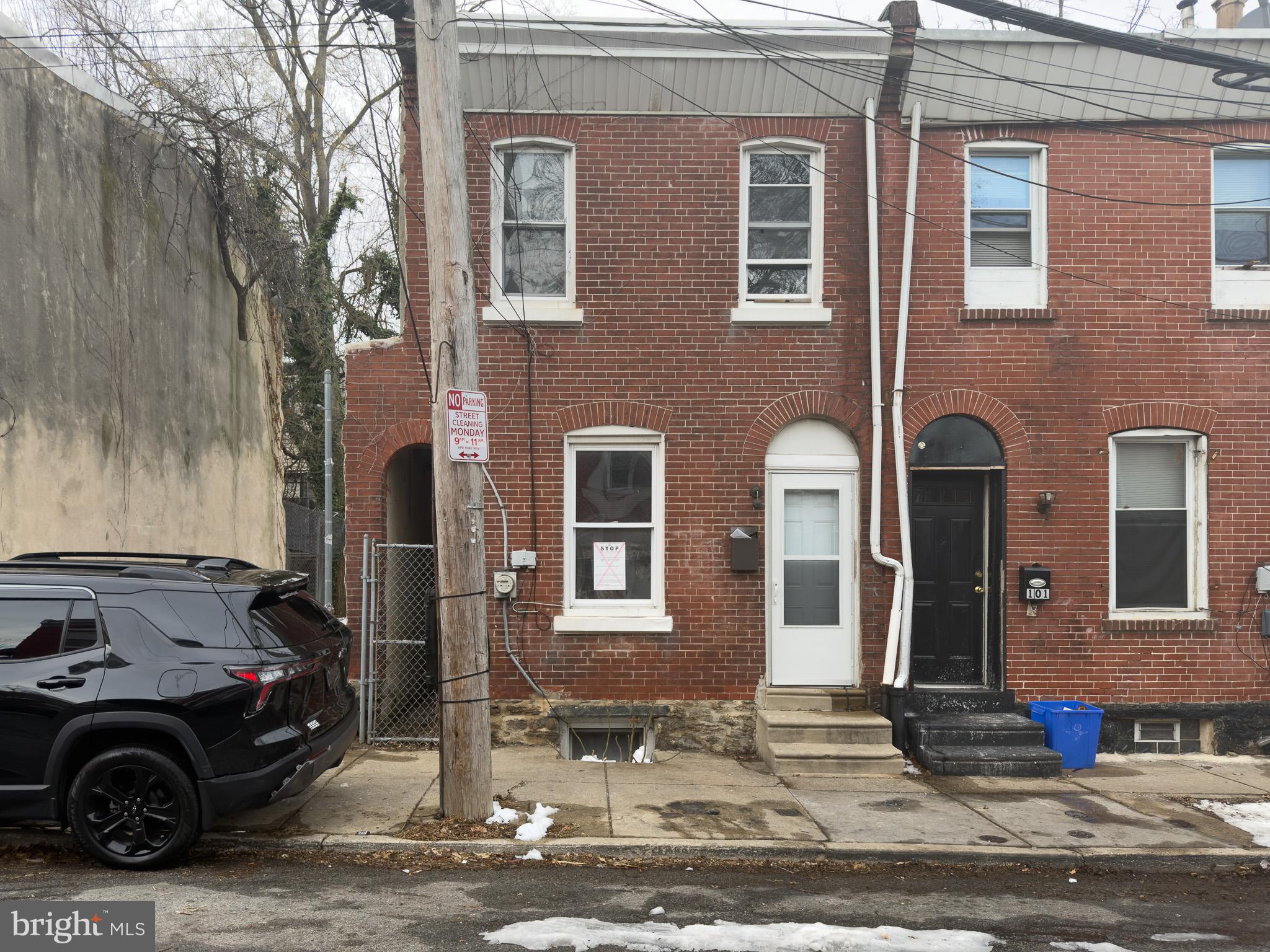 2 story, brick built Germantown property in need or full renovation.
