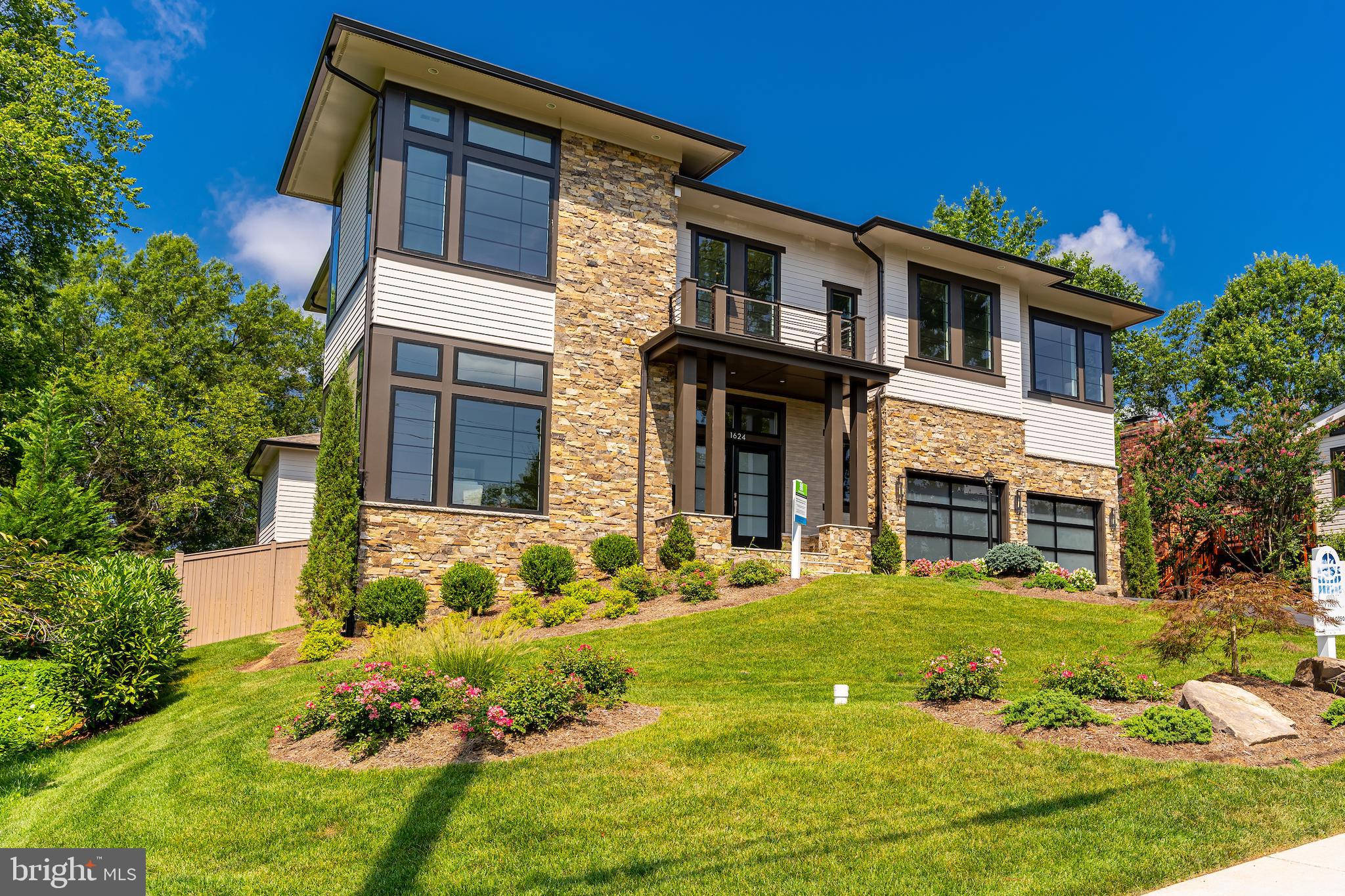 PHOTOS OF A SIMILAR-STYLE HOME BUILT PREVIOUSLY.    This residence captures a rare balance of warmth, serenity, and a clean contemporary feel — sophisticated yet comfortable, open yet inviting. Perfectly positioned at the end of a quiet cul-de-sac, 7205 Bayside Court offers a private retreat just moments from all that McLean has to offer.

Inside, the airy, light-filled layout centers on a stunning chef’s kitchen with Sub-Zero, Wolf, and Cove appliances, custom ceiling-height cabinetry, and an expansive waterfall island. A 16-foot glass wall opens from the family room to a spacious deck with a natural gas rough-in, creating effortless indoor-outdoor living and entertaining.

A highlight of the design is the main-level bedroom suite — a luxurious, private space ideal for guests, extended family, or future flexibility. Upstairs, the primary suite feels like a personal sanctuary, featuring dual walk-in closets, a coffee/wine bar, and a private terrace. Four additional guest suites, an upper loft, and a rooftop deck provide additional places to gather, relax, or work.

The fully finished lower level offers a large recreation room with fireplace, a stunning wet bar with appliances, bedroom suite, exercise room, hobby room, and flexible finished space perfect for media or play. Additional features include a three-car garage, elevator shaft, tall 8-foot interior doors, security and sound prewiring, and irrigation rough-in.

Construction is scheduled to begin soon — offering a limited opportunity to collaborate with Gulick’s professional designer to personalize the finishes and features, making this home distinctly your own.

The location is just as exceptional as the home itself — minutes to Tysons Corner’s world-class shopping and dining, McLean’s charming downtown and weekly farmers market, and a network of nearby parks, trails, and recreation areas that define the area’s natural beauty. With top-rated Fairfax County schools and a peaceful community setting, 7205 Bayside Court offers a lifestyle that is both refined and refreshingly livable.

Schedule a private tour to walk the lot and meet in the Design Studio to review plans and explore finishes. This is a rare opportunity to bring your vision to life in one of McLean’s most coveted locations.

Photos are of a similar home of the same model.