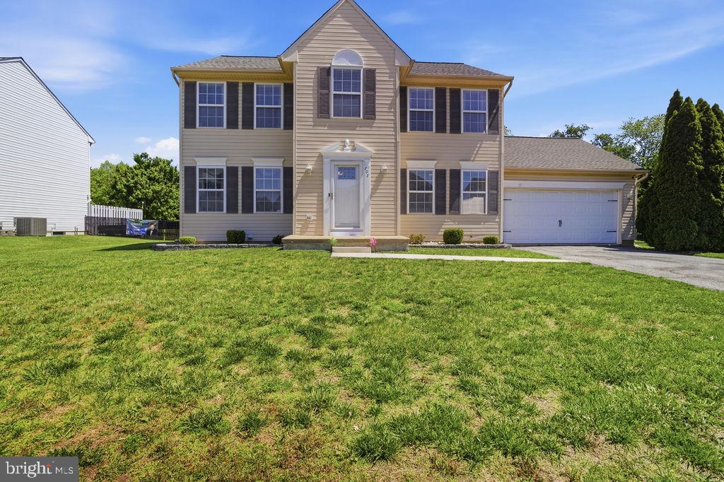 Wow! Pride of ownership describes this beautiful 24 year young home located in the community of Wynthorpe. Hardwood floors greet you and flow through to the lovely kitchen with a breakfast nook, center island, stainless steel appliances (refrigerator included), double pantry closets and access to the awesome rear deck and awesome, level back yard surrounded by a 6' fence for even more privacy aling with the mature landscape and trees. A spacious living room, dining room, powder room and family room are also located on the first floor.  Upper level has a large main bedroom with a full bath and also has double closets and a full bath with stall shower and double sinks. Three additional bedrooms and main bath are also on the 2nd floor. The awesome finished basement features the large laundry area, a beautiful theater room with a granite dry bar (under bar refrigerator included) another bonus room for whatever fits your needs and plenty of storage. 2 year young roof and water heater, and a 2 car attached garage are more perks to this lovely home in a beautiful neighborhood located just minutes from I-95, 495 and Route 1 for easy access to Philadelphia, Baltimore, New Jersey and Delaware Beaches, local shopping, attractions and parks. Come see! You wont be disappointed!