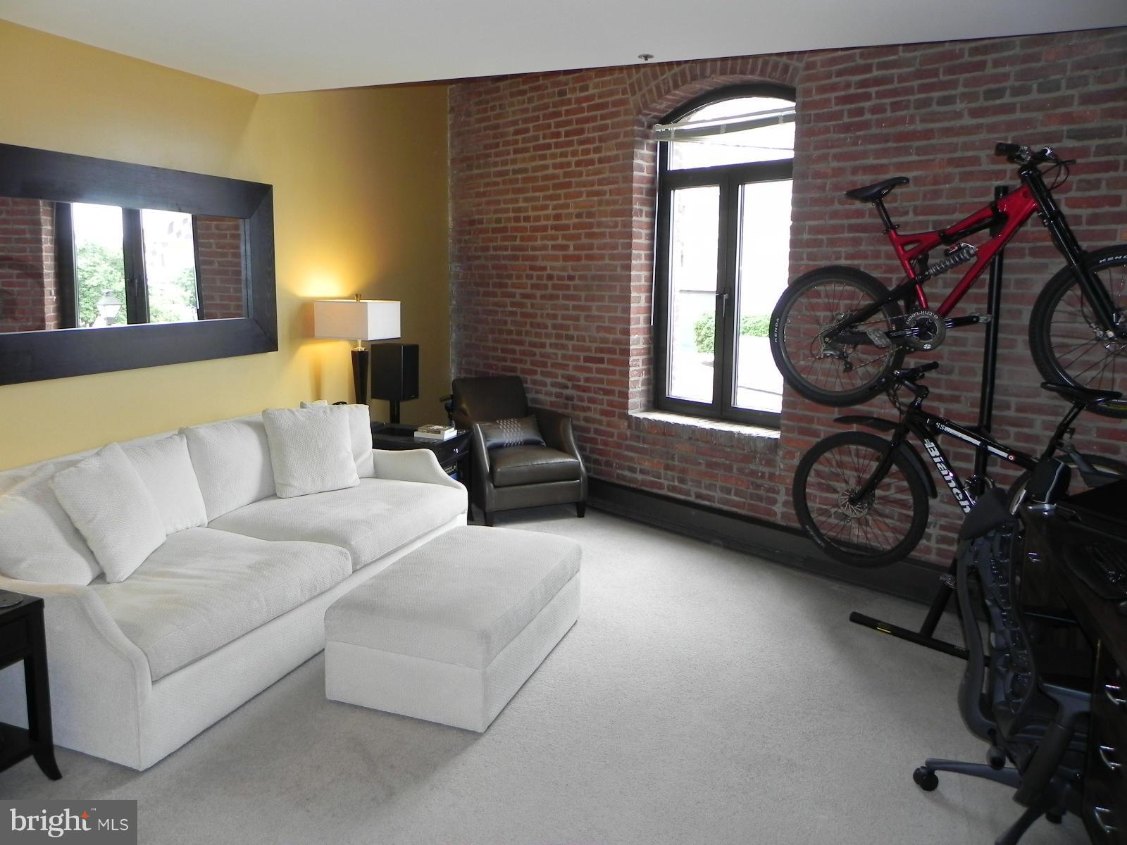 An unique 1 bedroom loft condo in Fells Point by the water's edge, in a renovated historic tobacco warehouse, this 2 level condo offers a city /water view through high arched windows. Enjoy the convenience of being in walking distance of Fells Point's charming shops/restaurants, or the beauty of one of Baltimore's spectacular waterfront vistas. One garage parking space conveys with condo.