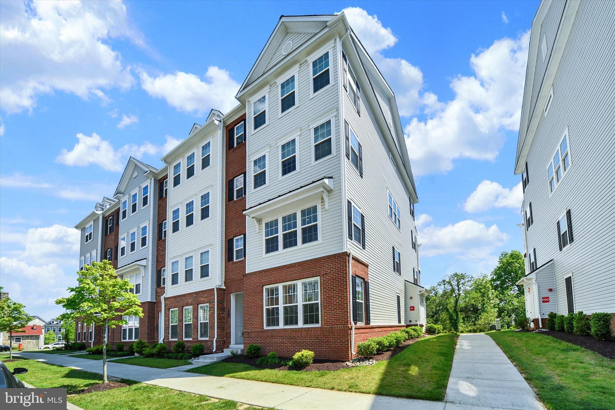 BONUS BENEFIT: 4.25% ASSUMABLE RATE FOR QUALIFIED BORROWERS. ASK FOR DETAILS! SPECIAL LOAN: PROPERTY ALSO QUALIFIES FOR 100% FINANCING. ASK FOR DETAILS! Welcome to Ballard Green. A Premier Community in Owings Mills. This stunning ground level two-story condo checks every box for today's discerning buyer. Barely four years young, this stylish home offers the perfect blend of modern design and low-maintenance living in one of Owings Mills' most sought-after communities. The main level impresses with an open, flowing layout featuring a generous living area, dining space, and an incredible kitchen loaded with cabinet and counter space, gleaming stainless steel appliances, and gas cooking, ideal for the home chef who loves to entertain. Upstairs, retreat to a luxurious primary suite complete with a spa-inspired owner's bath boasting a gorgeous walk-in shower with bench and a large walk-in closet. A second spacious bedroom, full bath, and a versatile loft, perfect for evening reading or movie nights. The loft also gives entry to a private balcony perfect for your morning coffee or an evening cigar under the stars. Practical needs are covered here, too: a single-car garage plus a private parking pad, with ample overflow parking throughout the community. And the best part? Forget the shovel, forget the lawn mower, and forget the roofing contractor. All exterior maintenance is handled for you, giving you your weekends back. Ballard Green's resort-style amenities elevate everyday living with a large outdoor pool, kiddie pool, fully equipped fitness center, clubhouse, tot lots, playgrounds, and landscaped common grounds. Steps from Lyon's Mill Elementary and minutes from the shops and dining at Foundry Row, with effortless access to I-795 and the Owings Mills Metro. This community truly has it all. Smart, stylish, efficient, and essentially maintenance-free — this is living at its absolute finest. Welcome home.