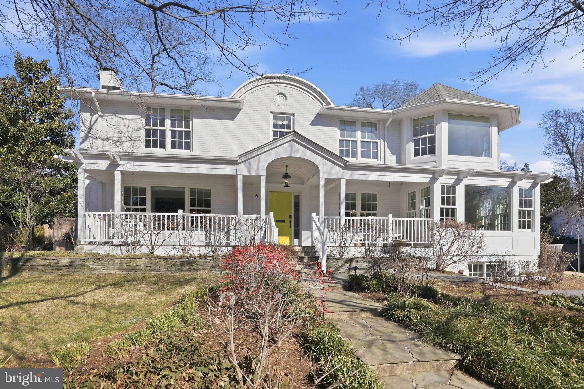 Welcome to 8 Stewart Avenue, located on a rare double lot in the heart of downtown Murray Hill, one of Annapolis’ most coveted downtown neighborhoods. This is an exceptional opportunity to own a completely rebuilt residence offering refined luxury, architectural pedigree, and extraordinary indoor–outdoor living. Designed by Charles Anthony and expertly constructed by Mickey Emory Construction, with interiors by D & L Design, the home was comprehensively renovated in 2014 with uncompromising attention to detail and the highest quality finishes.  As you approach the home, you are immediately struck by the stunning architectural details and the iconic Van Gogh Yellow Hollandlac-painted front door, which welcomes you into a lovely foyer featuring dark wood inlaid floors and double-closet storage. Throughout the residence,  Lauzon beech hardwood flooring in a pearl finish provides timeless elegance.  To the right, the home opens to the casual living side, showcasing open-concept living at its finest. The chef’s kitchen is both beautiful and highly functional, anchored by custom heartwood walnut cabinetry crafted by Woodworking by Design, which extends throughout the kitchen, bar, fireplace mantel, and living room shiplap feature wall. A 12-foot island clad in Bianco Rhino marble with a waterfall edge is complemented by a 48” Sub-Zero Pro stainless steel side-by-side refrigerator, a 48” dual-fuel Wolf range with six burners and griddle, and an Asko dishwasher—creating the perfect space to cook and gather. A large walk-in pantry and direct access to the outdoor kitchen zone complete the kitchen.  The casual dining area is spacious and inviting, surrounded by Marvin double-hung windows that bathe the space in natural light. The formal living and dining side offers the perfect backdrop for elegant entertaining. The living room features a custom honey onyx granite fireplace, heartwood walnut shiplap feature wall, and a refined panel of white café Hollandlac paint. The dining room is equally impressive, highlighted by a dramatic chandelier and custom ceiling treatment. A built-in buffet with a wine refrigerator and storage creates an ideal setting for cocktails and gatherings.  Expansive double sliding doors lead to the exceptional outdoor living space, highlighted by a 25’ x 20’ vaulted pavilion with a tongue-and-groove cedar ceiling. The outdoor kitchen features a Big Sur 48” grill with side burners, an outdoor refrigerator, flagstone countertops, ledgestone veneer, custom tile finishes, and a fully enclosed custom cedar fence. A professionally designed irrigation system services the entire property, offering 23 rotary heads, 12 pop-up heads, nine zones, and dual control valve boxes.  Retreat to the second level, where a stunning five-star primary suite awaits, designed for comfort and elegance. The expansive primary retreat features a spa-inspired marble bathroom with heated floors, a freestanding soaking tub, an oversized custom shower with dual shower heads, and refined finishes throughout. The dramatic wall-to-wall “runway” walk-in closet offers boutique-style storage and display. Three additional generously sized bedrooms and two full bathrooms—one en suite—feature custom tilework and high-end fixtures. A dedicated second-floor laundry room adds convenience, while a large skylight floods the level with natural light.  The lower level is thoughtfully reimagined with a spacious family room, abundant storage closets, and a private guest suite complete with a connecting full bathroom featuring heated floors and a seamless glass shower—ideal for guests or multigenerational living.  Do not miss the opportunity of a lifetime to own this one-of-a-kind Murray Hill masterpiece. Please contact the listing agent for additional information. Welcome home!