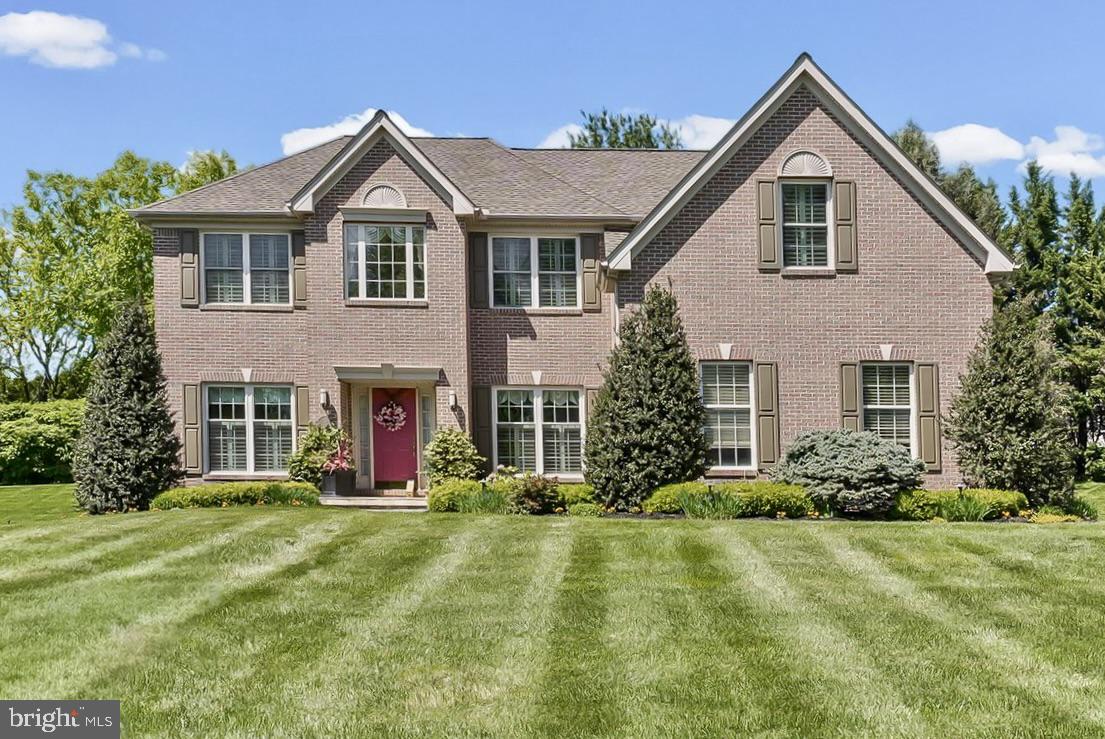 Rarely available brick Colonial in the sought-after Brookstone community. This elegant residence offers a thoughtfully designed floor plan with an open-concept kitchen and family room that serves as the heart of the home, complemented by gracious formal living and dining rooms ideal for entertaining. A pair of private main-level offices provide exceptional work-from-home flexibility and open to a charming screened porch overlooking beautifully curated landscaping and hardscaping. A convenient main-floor laundry room adds everyday ease.

Upstairs, four well-appointed bedrooms include an expansive primary suite featuring a generous sitting room, ensuite bath, and walk-in closet. The finished lower level provides abundant additional living and recreation space. Perfectly positioned just two doors from the community playground and minutes from shopping, dining, and daily conveniences, this home blends comfort, sophistication, and an exceptional location.