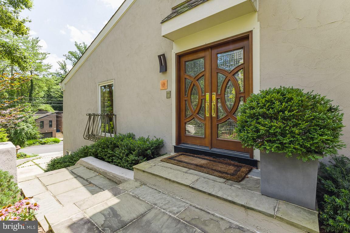OPPORTUNITY KNOCKS in FRANKLIN PARK !! A real opportunity to live in one of the most sought after neighborhoods known for  it's convenience, privacy, luxury and beauty.  

1924 Rhode Island Ave is for the savvy buyer seeking the distinction  of Franklin Park on a slightly smaller scale than many of the larger estate- like homes.  This contemporary home has a one- of- a -kind primary suite on the upper level designed with a soaring ceiling,  with a state- of- the- art spa bath,  a snug fireplace & 2 walk in closets. The main level offers a 2nd bedroom and full modern bath,  plus  an office (or 3rd bedroom if you prefer) with a view of the rear yard.  The lower level offers a 3rd bedroom or office...spa like full bath on this level as well. Sophisticated living with a minimalist flair.. Privacy for  outdoor entertaining...large patio and hidden hot tub.  Come see this one...

 To complete the main level, the dining area is adjacent to a gourmet kitchen with an island breakfast bar and a cozy sitting area for just that...sitting and relaxing.   A few steps away is the sunken  living room  with cathedral ceiling, tall windows which overlook the lush greenery Franklin Park is noted for,  a cushy window seat and fireplace.  A stunning floor plan and a comfortable one as well!

The lower level offers a 4th  bedroom (or office) and remodeled full bath , a spacious laundry room, and garage (2 car) access. And the garage has been outfitted by Tailored Living to include a Tesla Charger.  The current owner has updated/remodeled all the right things to make this house like new.  Cost was over $200,000.00.  An itemized list is at the house for you to see.  

The other  must-see feature of this property is the yard...lush  and private with a hot tub, privacy fencing, fitting hardscape and landscape, with lighting and an invisible dog fence. The deck is perfect for al fresca dining. This is a true opportunity to own a lovely home in Franklin Park...come take a look...