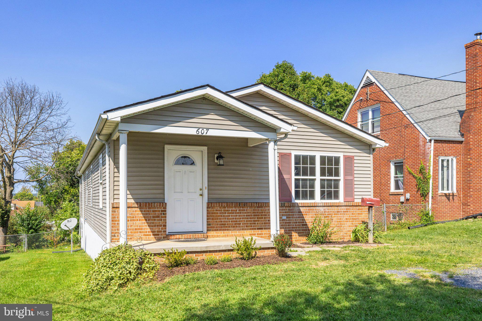 This adorable rambler is ready for new owners! Located near the Shenandoah River, this property is within walking distance to Eastham Park and is a short drive into downtown. Step inside into an open floor plan living room, dining room and kitchen, making this a great space for entertaining friends and family. The three spacious bedrooms are just down the hall, as are the two guest bathrooms. The primary suite offers an abundance of closet space, and a private bathroom featuring double sinks and a separate tub and shower.  There is also a flex space that can be used as another bedroom, office, rec room, etc.  A separate laundry area/mudroom completes the main level and gives access to the large fenced-in yard. The recently finished basement provides an additional area that can have multiple uses. Other recent updates include a new roof in 2021, new HVAC in 2022 (inside and outdoor units), and the driveway was redone in 2023. All you have to do is move in! Priced below recent appraisal at 375k and ready for new owners for the Holidays!