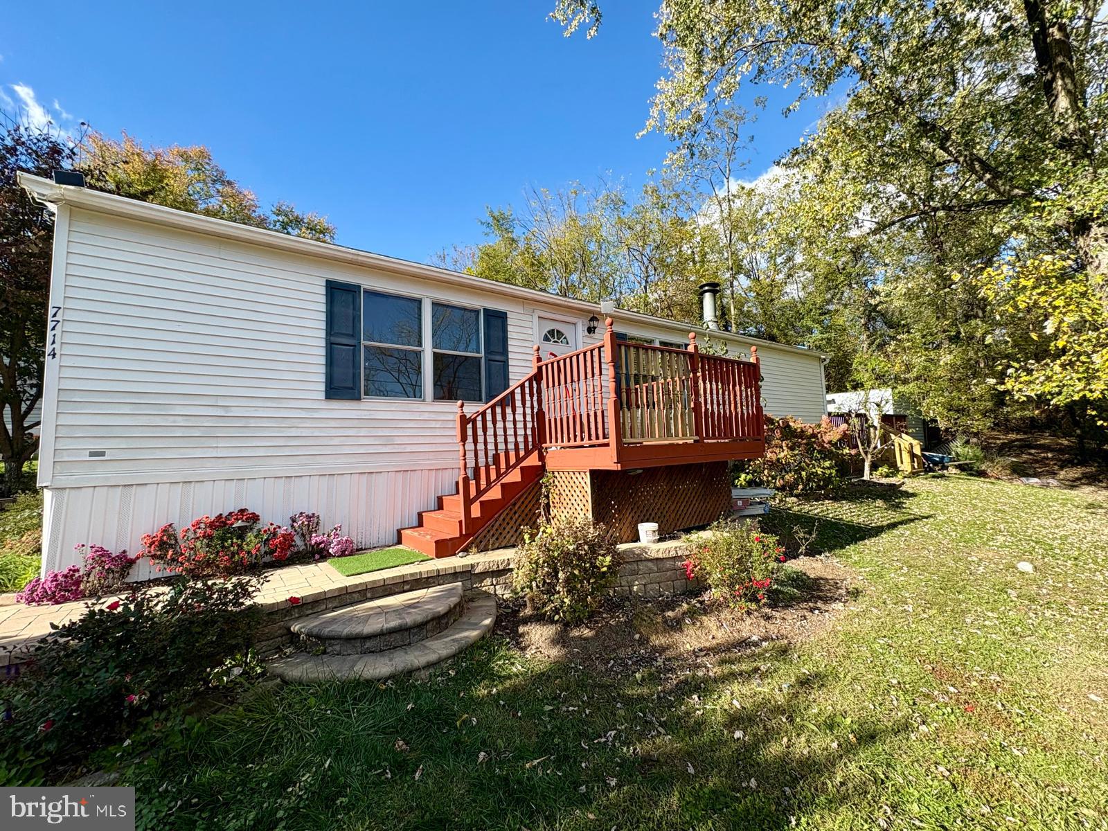 Back on the market! Buyer got cold feet at the last minute—now it’s your opportunity!  Welcome to this charming and cozy 3-bedroom, 2-bathroom mobile home in Pheasant Ridge, Mount Airy, MD! This home features numerous recent upgrades, including a new roof in 2023, kitchen remodeled in 2020, microwave installed in 2025, and new flooring in the living room and kitchen in 2025. Both bathrooms were remodeled in 2020, and the water heater was replaced in 2021.
Enjoy outdoor living with a backyard deck added in 2025 and a shed with window AC installed in 2022. The ground rent includes water, making it an affordable and move-in ready opportunity. Don’t miss this well-maintained home with plenty of upgrades! The property is being sold AS-IS, however inspections are welcome for informational purposes. Ground rent is $1,110 per month and includes water, sewer, trash, and taxes. This is a mobile home, and the foundation is not permanent.