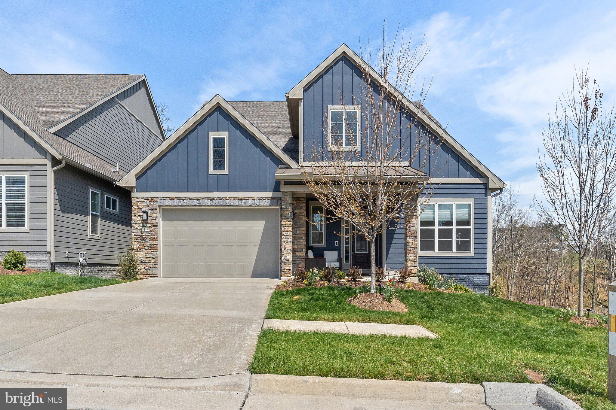 Welcome to effortless elegance and everyday comfort in this beautifully upgraded Craftsman-style home in the 55+ gated community of Lake Frederick. Perfectly positioned on a private corner lot backing to mature trees, this home offers over 3,100 square feet of refined living space and more than $265,000 in premium designer upgrades.<br><br>
Inside, wide-plank white oak hardwood floors diagonally laid, designer light fixtures & fans, custom window treatments, and an open, light-filled layout set the tone for relaxed luxury. The Signature Kitchen impresses with floor-to-ceiling cabinetry, under-cabinet lighting, and high-end finishes. A sun-drenched sitting room and private covered deck invite you to unwind with peaceful wooded views.<br><br>
Downstairs, a finished lower level adds flexibility for hobbies, guests, or game nights, with spacious storage rooms. The spa-like primary suite features a walk-in glass shower, dual vanities, and elegant tilework.
This Smart Home is fully outfitted for worry-free living with keyless entry, whole-house humidifier, air cleaner, water softener and de-chlorination system, extended garage, extra insulation, in-ground irrigation system, and battery backup sump pump. Full lawn care is included in the HOA—just lock the door and go. This is truly lock-and-leave living done right.<br><br>
More than just a beautiful home, Lake Frederick is a vibrant lifestyle. Residents enjoy resort-style amenities & clubs including indoor and outdoor pools, tennis, pickleball, a state-of-the-art fitness center, dog park, and over 8 miles of scenic trails. Meet friends at the clubhouse or enjoy a sunset dinner at Region’s 117, the community’s lakeside farm-to-table restaurant. With the Blue Ridge Mountains as your backdrop and easy access to I-66, I-81, and nearby attractions like Skyline Drive and Shenandoah National Park, adventure is always within reach.