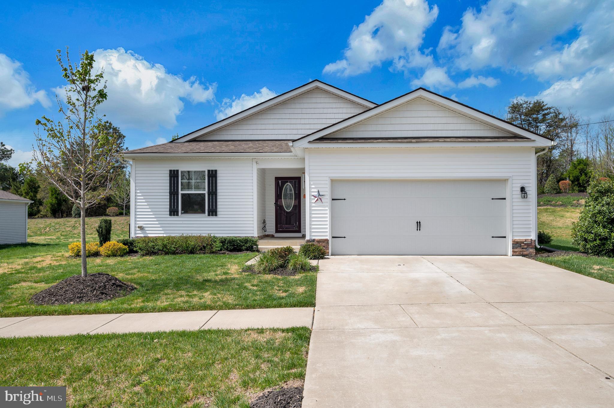 NOW AVAILABLE!  OVER $30,000 IN REMODELING (2022-2023 Luxury Vinyl Plank Flooring, Stone Patio & Walkway, Aluminum Fence, Home Generator Rough-In, Custom Paint, AC Unit, etc.) 

This Lismore model by DR Horton, built in 2021, has been freshly updated with CUSTOM PAINT and is truly MOVE-IN READY. Enjoy the ease of ONE LEVEL-LIVING with three generously sized bedrooms and two full baths, making this home ideal as a starter home or a comfortable option for those looking to downsize. With 1,531 square feet of finished living space, the layout offers both FUNCTIONALITY AND COMFORT. The generous Two car garage is great for overflow storage!

The kitchen and dining areas are perfect for entertaining family and friends. Featuring upgraded STAINLESS APPLIANCES, GRANITE COUNTERTOPS, and AMPLE COUNTER SPACE,!  The kitchen is as stylish as it is practical—ideal for cooking, baking, or meal prep. A SPACIOUS PANTRY provides excellent storage. Dining options are flexible, whether you prefer casual seating at the bar or gathering around the table in the dining area. The family room offers a welcoming space for movie nights or relaxing evenings at home.  The PRIMARY SUITE is spacious, offers a PRIVATE BATH, and  a WALK-IN CLOSET ready to accommodate your wardrobe.  Two additional bedrooms and a well-sized full bath provide plenty of space for guests, family, or a home office.

Step outside to enjoy the thoughtfully designed outdoor space, complete with a finished PAVER PATIO and a black aluminum FENCED REAR YARD—perfect for al fresco dining or letting pets run freely in the yard. There is also an IRRIGATION SYSTEM making watering the grass a snap!

Located just minutes from Downtown Bowling Green, you’ll enjoy convenient access to local shops, restaurants, and even Mixing Bowl Bakery. Commuters will appreciate the easy access to I-95 for travel to Richmond or Fredericksburg, as well as Route 17 for a scenic alternative.
An exciting addition to the area is Kalahari Resorts & Conventions, just a 15-minute drive away. Soon to be Virginia’s largest indoor waterpark, it will feature over 175,000 square feet of entertainment and fun.