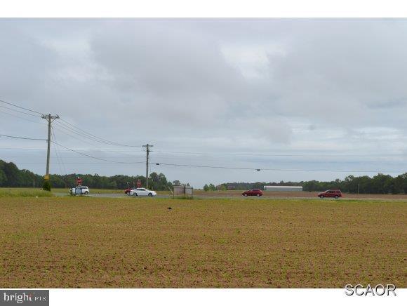 Valuable Corner Commerical Property Coastal Hwy RT 1 & 88 (Cave Neck Rd), 879 feet Hwy frontage / 4.7 acres Zoned B-1. Only Commercial property between FIVE POINTS Lewes & Milford w/Public Water & Sewer (18.8 EDU's). Zoned B-1 for a Convenience/Gas Store, Restaurant, Bank, Pharmacy, etc