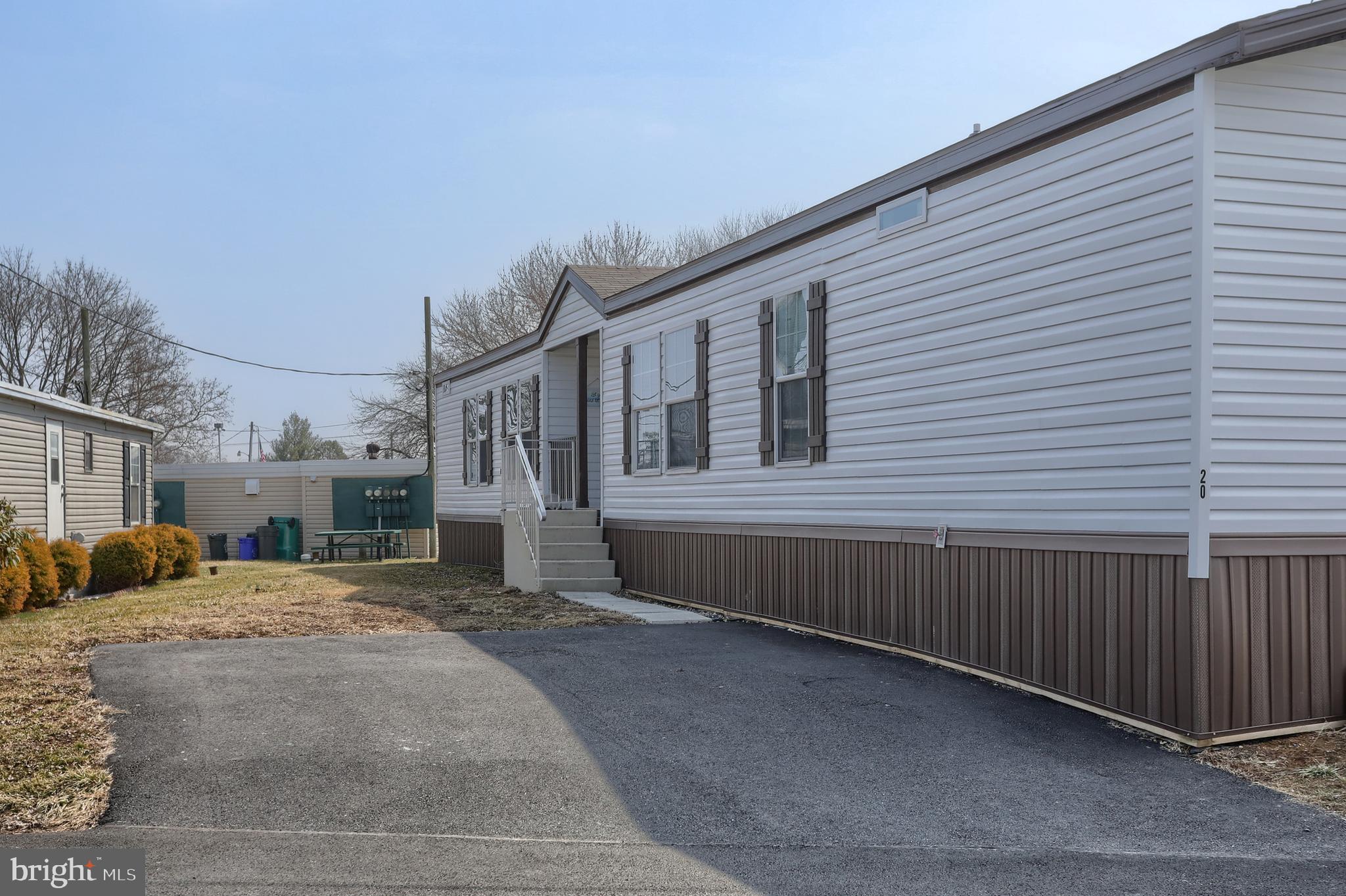 This beautiful, newer 3-bedroom, 2-bathroom mobile home offers comfort and modern living in a convenient location.  The cozy living room is enhanced by an electric fireplace, perfect for relaxing during colder months. The fully equipped kitchen includes stainless steel appliances and plenty of cabinet space, making it a great space for cooking and entertaining. The spacious master suite features a private en-suite bathroom and a large walk-in closet, creating a peaceful retreat.  Ideally situated close to schools, parks, and shopping, this property is perfect for families or anyone seeking a low-maintenance, move-in ready home. Schedule your private showing today.