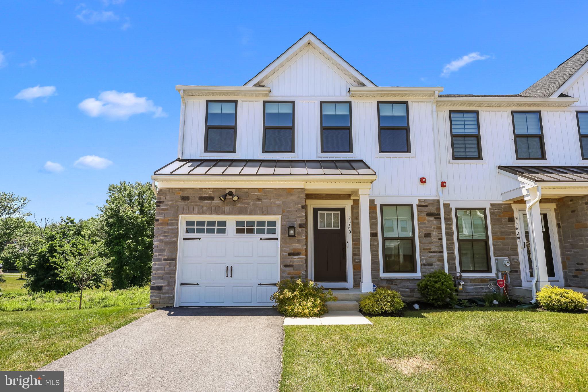 Welcome to this beautifully maintained 4 years young end-unit townhome in the highly sought-after Ashbourne Estates community. Offering 3 bedrooms, 2.5 bathrooms, a finished basement, and a premium private lot, this home combines modern finishes with a convenient location near major highways and Philadelphia. Step inside to a bright, sun-filled flex space that's perfect for a home office, sitting room, or additional entertaining area. The open-concept main level features a stunning kitchen with quartz countertops, a large breakfast island, full stainless steel appliance package, tiled backsplash, pantry, and abundant cabinetry. The kitchen flows seamlessly into the dining area and spacious living room, creating the perfect layout for everyday living and entertaining. Upstairs, you'll find three generously sized bedrooms along with the convenience of a second-floor laundry room. The primary suite offers an oversized walk-in closet and a private en-suite bathroom. The finished walk-out basement provides even more living space, ideal for a family room, gym, playroom, or media room, while still offering plenty of storage. Built just four years ago, this home features modern construction, updated finishes, and low-maintenance living. Situated on a premium private lot, it's truly move-in ready. Conveniently located with easy access to Route 1 and Route 73, and less than 10 miles from Center City Philadelphia, this home offers the perfect balance of comfort, style, and accessibility.