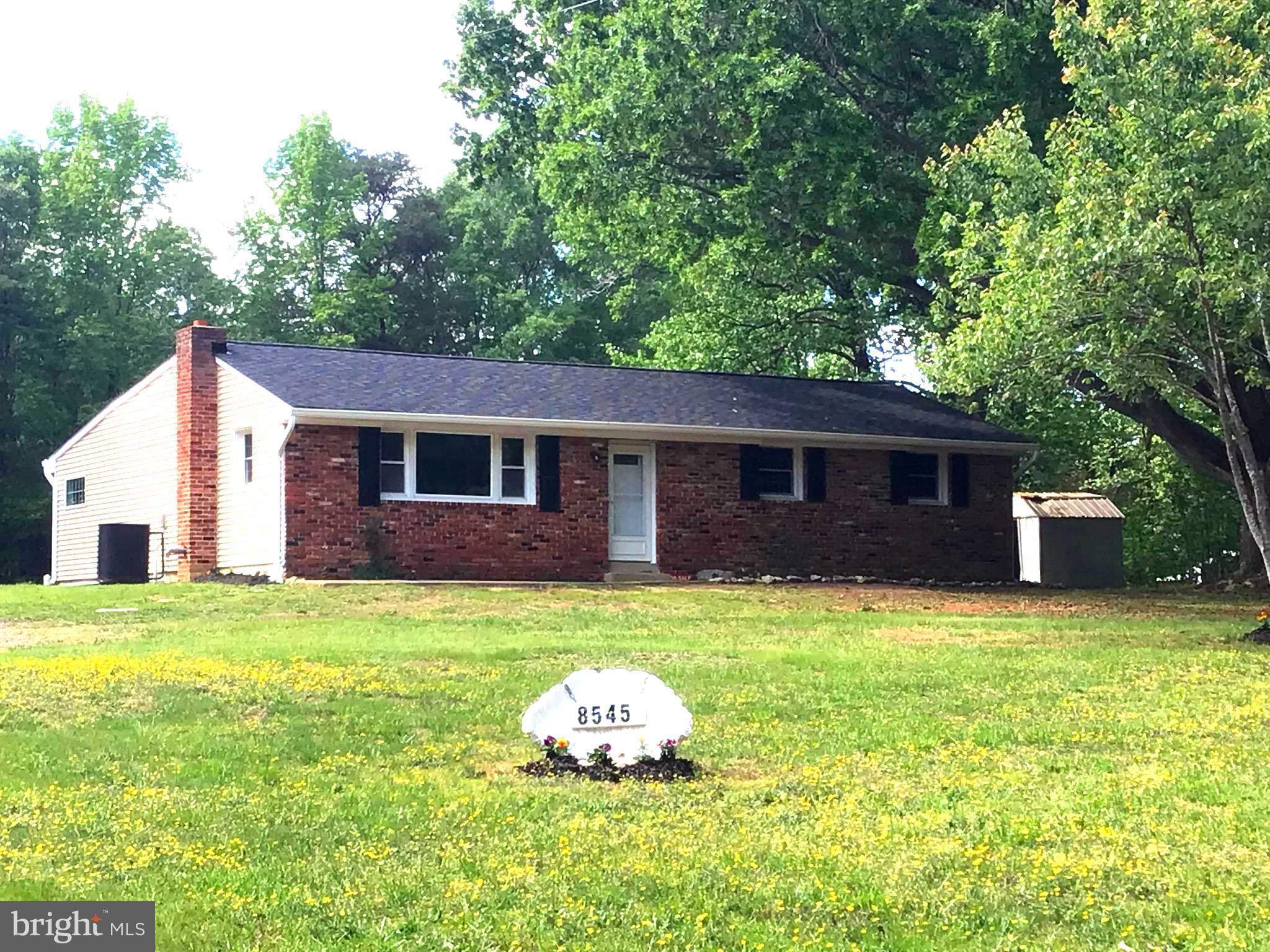 Priced to Sell!  $50,000 Reduction!  Come see this charming 3-bedroom, 2-bath home,  tucked away on a quiet country road!   Home offers the perfect blend of comfort, space, and serene rural living.  Situated on a level, generous 2-acre lot, surrounded by nature.  Inside, you’ll find over 1500 finished sq ft of thoughtfully designed completed remodeled living space, featuring both a welcoming living room and a separate family room; ideal for relaxing evenings or entertaining guests. The kitchen is a standout with its sleek granite countertops, offering both style and functionality for everyday living. Comfort is prioritized throughout the home, with ceiling fans in every room to keep the air flowing year-round. The bedrooms are cozy and finished with soft carpeting, while the main living areas feature durable and attractive laminate plank flooring for easy maintenance and a modern look.  Features 2 full baths, one with extra large soaking tub.  Home offers perfect layout to add a deck, patio, and/or front porch.  Whether you're enjoying your morning coffee surrounded by nature or unwinding after a long day, this property delivers a true country lifestyle experience; peaceful, private, and full of possibility.  And there's plenty of yard for all your favorite outdoor hobbies!  Take advantage of this major price reduction!