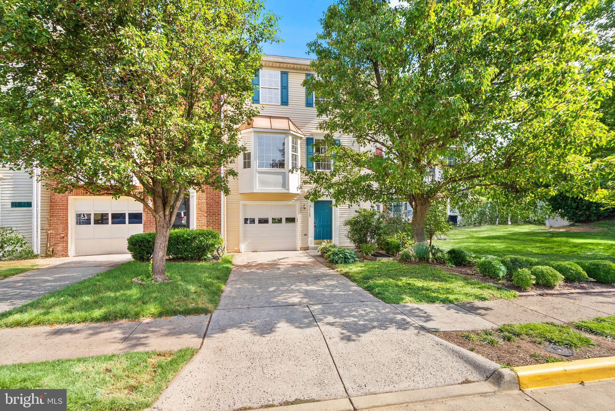 Tucked in the heart of Ashburn Farm, this beautifully maintained three-level townhome offers the perfect blend of walkable convenience and comfortable living. With approximately 1,846 square feet of living space including, three bedrooms and two full baths on the upper level, and two additional half baths, every inch of this home has been thoughtfully designed. Flower boxes, a manicured front yard, and a mature shade tree give this home standout curb appeal from the moment you arrive.
The entry level welcomes you with direct access from the attached garage into a gracious foyer that leads to a recreation room centered around a cozy fireplace. Glass doors open to a private rear patio and the fully fenced rear yard.  This main level also has a convenient half bath off the recreation room.  Hardwood flooring extends throughout the bright and spacious main level (upper level 1) designed for both everyday living and entertaining. A large bay window fills the family room with natural light before flowing seamlessly into the kitchen and dining area. The kitchen features beautiful butcher block countertops, a well-lit breakfast area with direct access to the expansive rear deck overlooking a private backyard, an ideal setting for morning coffee, outdoor dining, or simply enjoying the peaceful surroundings.
The bedroom level (upper level 2) offers three well-appointed bedrooms, including a spacious primary suite with a en-suite bath. Two ample sized secondary bedrooms share a full hall bath, providing comfortable accommodations for family, guests, or flexible living. A new water heater and air conditioning unit, both replaced in 2025, provide added peace of mind for the next owners.
In the heart of Ashburn, this residence provides easy access to walk/bike paths that lead to the W&OD Trail, Restaurants, shops, breweries, parks, and commuter routes all within easy reach, making this an exceptional opportunity in Ashburn!