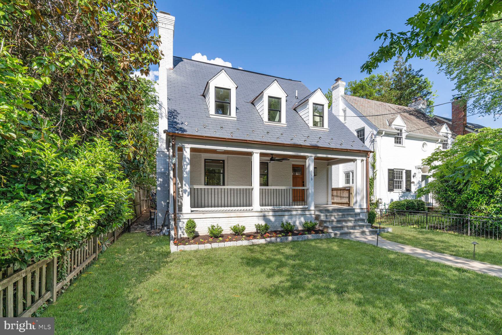Welcome to this stunning, fully rebuilt and expanded home offering over 4,500 square feet of luxurious living across four impeccably finished levels in the heart of Chevy Chase, DC. Thoughtfully designed with custom finishes and top-tier systems throughout, this 6 bedroom, 5.5 bath home combines timeless elegance with modern sophistication.

The main level features an entry foyer, formal living room with fireplace, dining room, chef’s kitchen open to the family room, butler’s pantry, and powder room. Carefully designed for entertaining, the open floor plan is perfect for large gatherings while parts of the home may be enclosed for privacy and more intimate gatherings. The gourmet kitchen features a large center island, custom cabinets, and premium Thermador appliances including custom paneled French door refrigerator and dishwashers (two), The adjacent butler’s pantry includes a wine refrigerator, ice maker, and wet bar.

The second level includes a light-filled and spacious primary suite with a walk-in closet and en-suite bath with double sinks and a large glass enclosed shower and soaking tub area. Two additional bedrooms with en-suite baths, laundry #1, and storage complete this level. The surprising third floor was newly added to the home and makes for the perfect kids hangout zone or private office setting. Complete with two sitting areas, two bedrooms, full bath, and balcony with tree top views.

The lower level, which can be accessed from outside, includes a play room, bedroom #6/gym, full bath, laundry #2, and huge storage space with outdoor access. Outdoor living includes a spacious terrace and private yard, while the one-car garage features a dedicated 50-amp EV charger and an additional parking pad for two or more vehicles. Ready for summer, an optional outdoor kitchen can be added as the terrace is prepped with a gas line, water & drain for sink, and electricity.

Smart living is made simple with the Brilliant home automation system, offering integrated control of lighting, music, intercom, and Ring security. Enjoy crystal-clear sound with wired surround sound in the family room, six indoor speaker zones, and three exterior zones—perfect for both entertaining and relaxing. The home is outfitted with Pella Impervia windows, all-new plumbing and electrical systems, all new roofs with synthetic slate on the front, and a 5-zone Carrier HVAC system—including a dedicated zone for the Primary Suite for personalized comfort. Dimmable LED lighting throughout the home allows for optimal ambiance at any time of day.

Located just blocks from Lafayette Elementary School, Lafayette Park and Rec Center, and the beloved Broad Branch Market, with easy access to Connecticut Avenue’s shops and restaurants and just minutes from Downtown D.C. A rare opportunity to own a turnkey luxury home in a coveted neighborhood—this is Chevy Chase living at its finest.