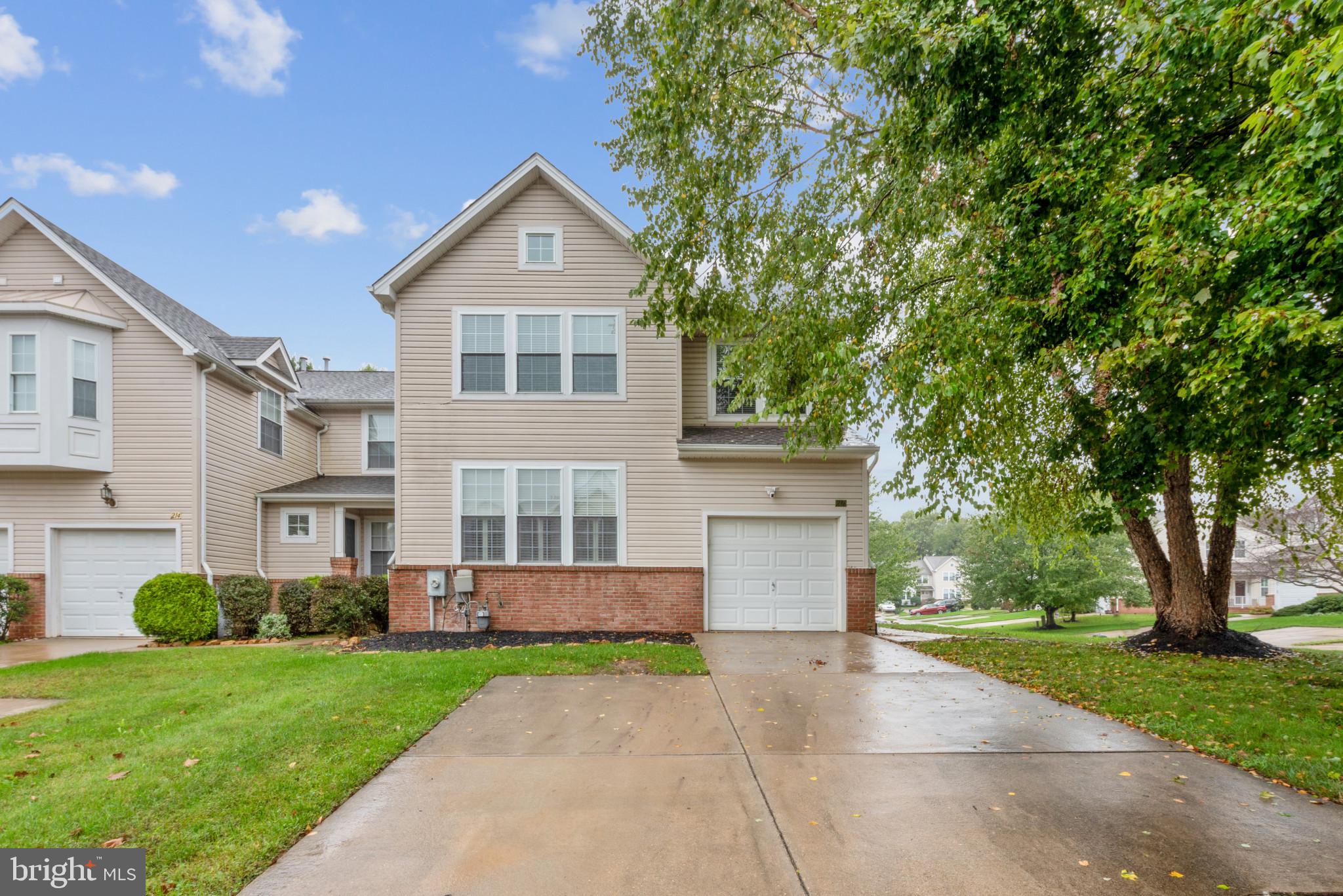 This stunning end-of-group townhome offers over 3,000 square feet of thoughtfully designed living space, featuring 4 spacious bedrooms and 3.5 fully remodeled bathrooms. The open floor plan welcomes abundant natural light, accentuated by high ceilings and elegant finishes throughout. The main level includes a luxurious primary bedroom with an en-suite bathroom that has been tastefully updated with marble floors and granite countertops. Gleaming hardwood floors flow through the living room, while the kitchen impresses with stainless steel appliances, ample cabinet space, and plantation shutters for a touch of elegance.

The fully finished walk-out basement offers additional living space, complete with stylish LVP flooring, a fourth bedroom with an en-suite bathroom, and a convenient barn door for added privacy. The basement also houses a laundry area, with hook-ups available on both levels for added flexibility.

Upstairs, two generously sized bedrooms share a recently renovated bathroom, and LVP flooring replaces all carpet for easy maintenance. The enclosed, screened porch in the backyard provides a peaceful retreat, perfect for relaxing or entertaining, while the fenced yard offers privacy and a scenic view of the woods.

Additional features include a new 50-year roof, modern lighting fixtures, ample storage and closet space, and fresh paint throughout. The townhome is located in a welcoming neighborhood with a top-rated school district and is within walking distance of local shops, restaurants, and medical offices. With its proximity to downtown Bel Air—just a 7-minute drive away—this home offers both convenience and tranquility, making it the perfect blend of comfort and luxury.