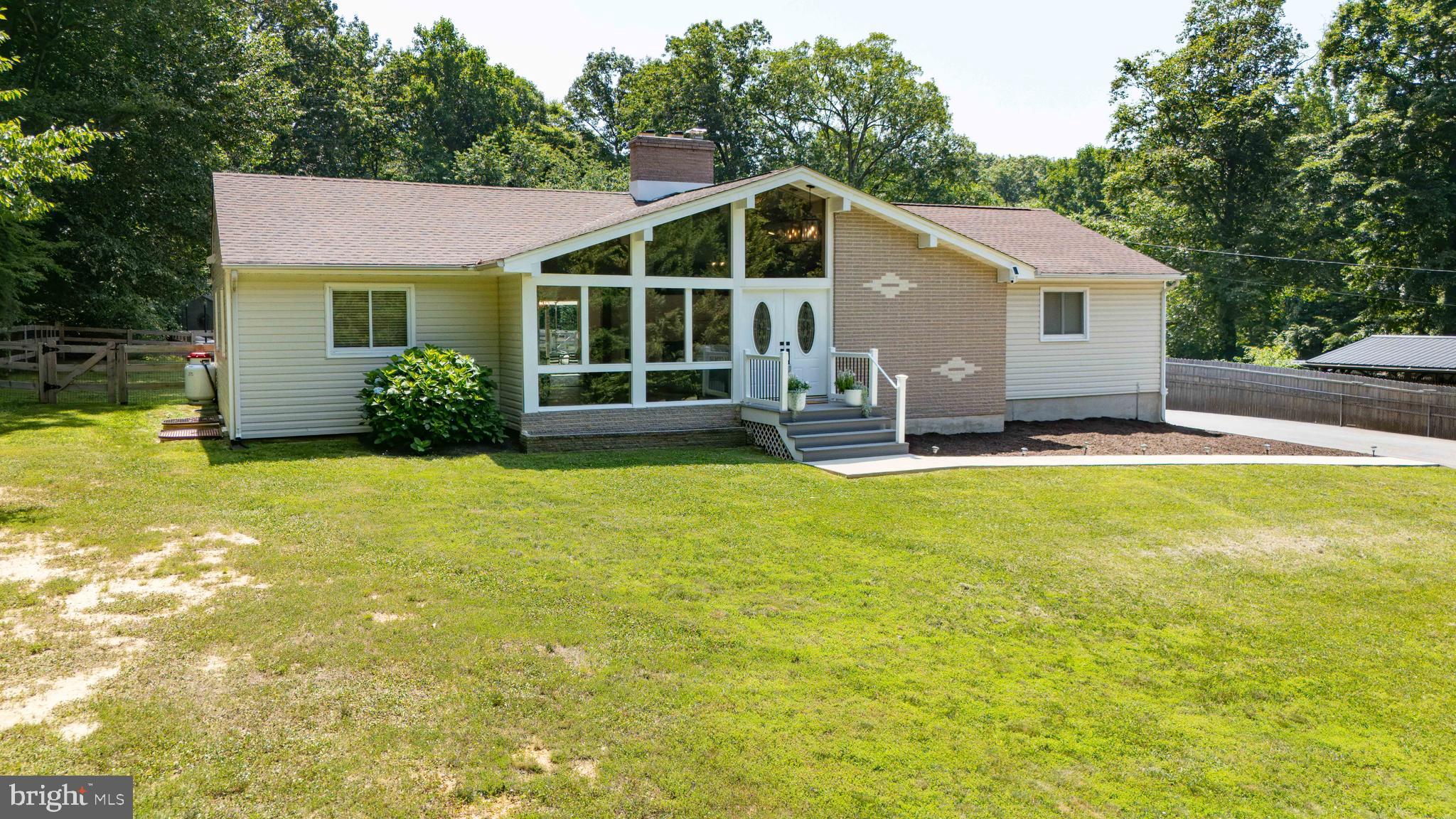 Move-in ready 4 bedroom, 2.5 bath rancher completely renovated 3 years ago and situated on 2.5+ acres in Port Deposit! As you step inside, you are welcomed with an A-Frame living room with exposed beams, an abundance of natural lighting, and a gas fireplace. Continue around the corner to the beautiful gourmet kitchen with breakfast bar, quartz countertops, stainless steel appliances, and coffee bar. The kitchen opens seamlessly to the dining area, which offers ample space for a large table. Two spacious bedrooms, a full bath, half bath, and an oversized two-car garage round-out the main level. The partially finished lower level offers two bedrooms, large bathroom with custom tile shower, and a family room with a gas fireplace. The lower level also has an unfinished area for storage, laundry, and utilities. Retreat outside to your own private summer escape! Relax and entertain with a 20'x42' inground pool (new liner 2023 and new pool pump 2025). The rear yard also offers a patio, Amish-built shed (new 2023), and a large fenced area (fence new in 2023). In 2024, the attic and basement were further insulated and the front A-Frame windows were tinted to improve energy efficiency (per recommendations from Delmarva's home energy assessment). Conveniently located near I-95, Aberdeen Proving Ground, MARC train station in Perryville, marinas, and restaurants.