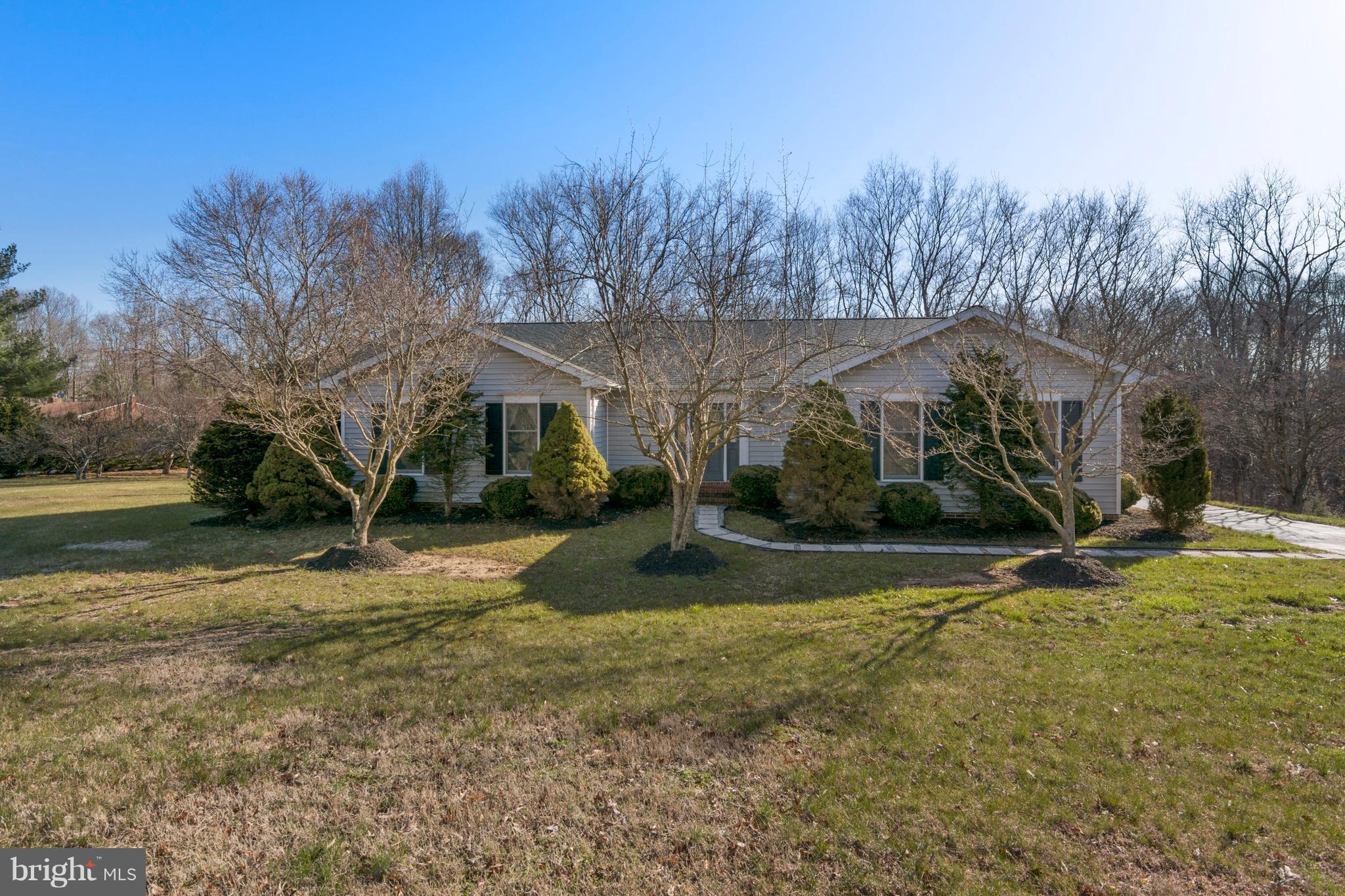 One level living at its best on 3 acres. Ceramic tile and new carpet throughout the house.  Large bright kitchen with granite tops, large island, recessed lights and double refrigerators. Bedrooms are nice sized with the master separate from the others. Bathrooms have all been updated.  Oversized garage with new doors and a lot of storage. The roof and HVAC systems are less than 10 years old.