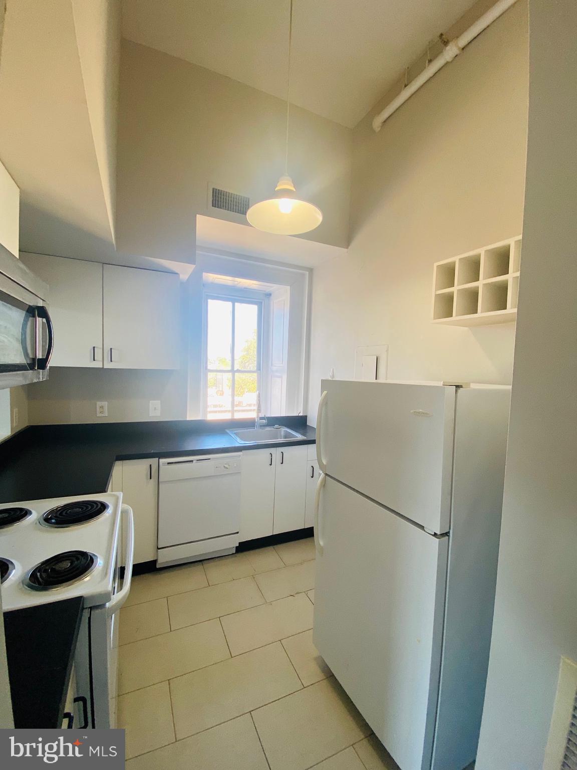 AVAILABLE NOW! 

Huge, open studio with great views and amazing layout in the heart of Manayunk on Main St! Historic building with an elevator. Apartment has central heat and air, washer/dyer in unit, high ceiling with huge skylight and great architectural details. Come check out the gorgeous 20+ foot ceilings with ornate design and tall windows looking out to Main St and the valleys beyond. This will not last! Next to Insomnia cookies, tons of cafes and and ice cream shops, a furniture store, parks and walking trails, and much, much more!  
The tenant pays gas, electricity, and a $35/month flat fee for water. Parking is available across the street for $150/Month.
The pet fee is $30/month per pet.