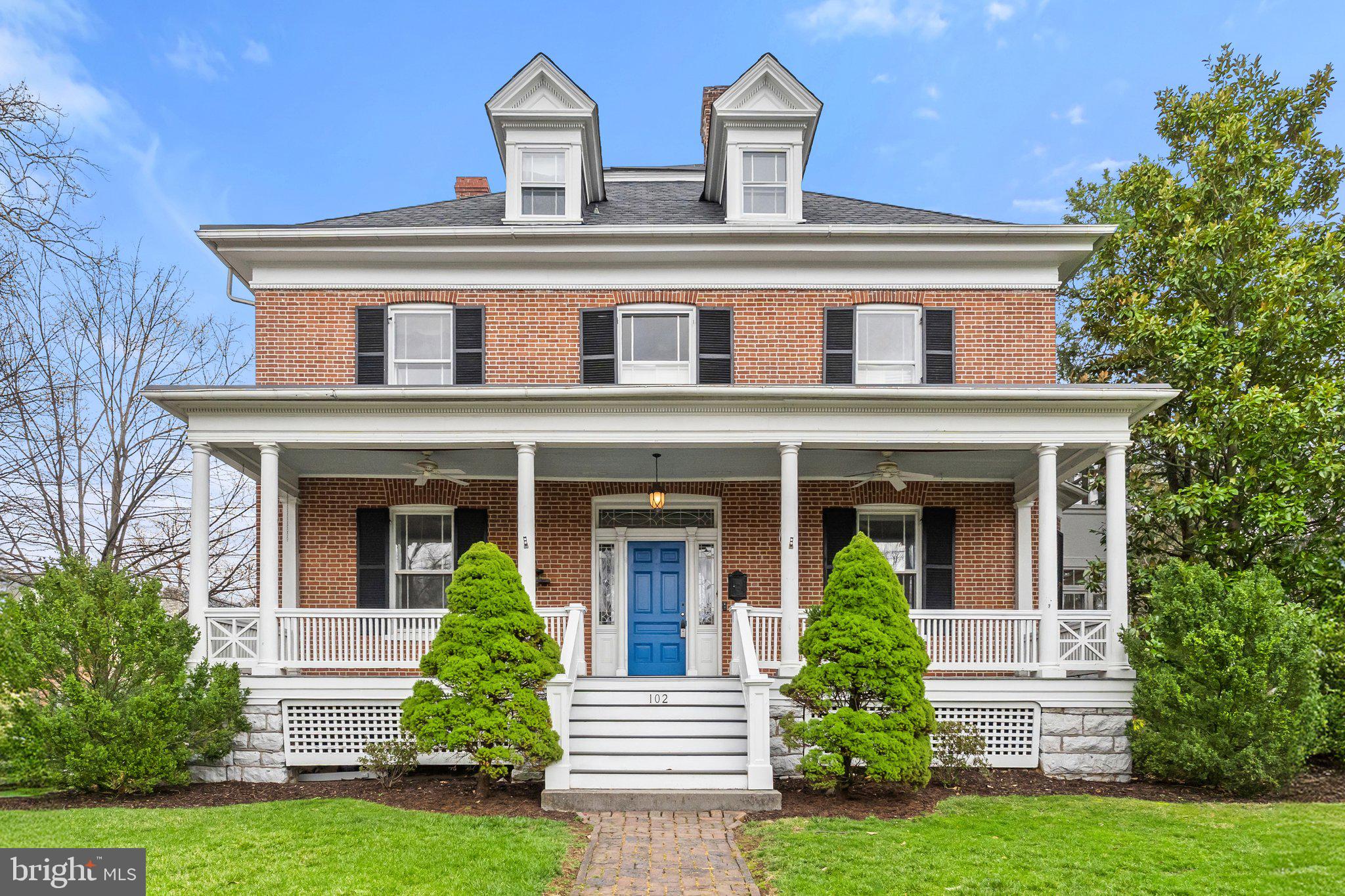This elegant 7 bedroom home sits on a spacious corner lot in Winchester's historic district. The all brick construction sits on a native limestone foundation. The beautiful front yard is surrounded by a raised stone wall and overlooked by the large front porch offering wonderful space for entertaining or a comfortable to relax. The private backyard is great family space and play area and features a large flagstone patio with access to the beautiful sun porch, as well as a live turf putting green! Inside, beautiful hardwood floors throughout the home complementing large rooms with high ceilings. The first floor features front and side entrances, large central hall, elegant parlors on either side of the entry, the large and equally elegant dining room, each with a fireplace, a office or study, and the inviting sun porch and a spacious modern eat-in kitchen. On the second floor is the charming primary suite with modern bath and fireplace. Second floor also includes 4 other bedrooms, a second bath, and laundry. On the third floor are 2 more bedrooms, a full bath, and plenty of storage. The property is zoned RO1 the first floor could be used as office with living space on the second and third floor. What a house!