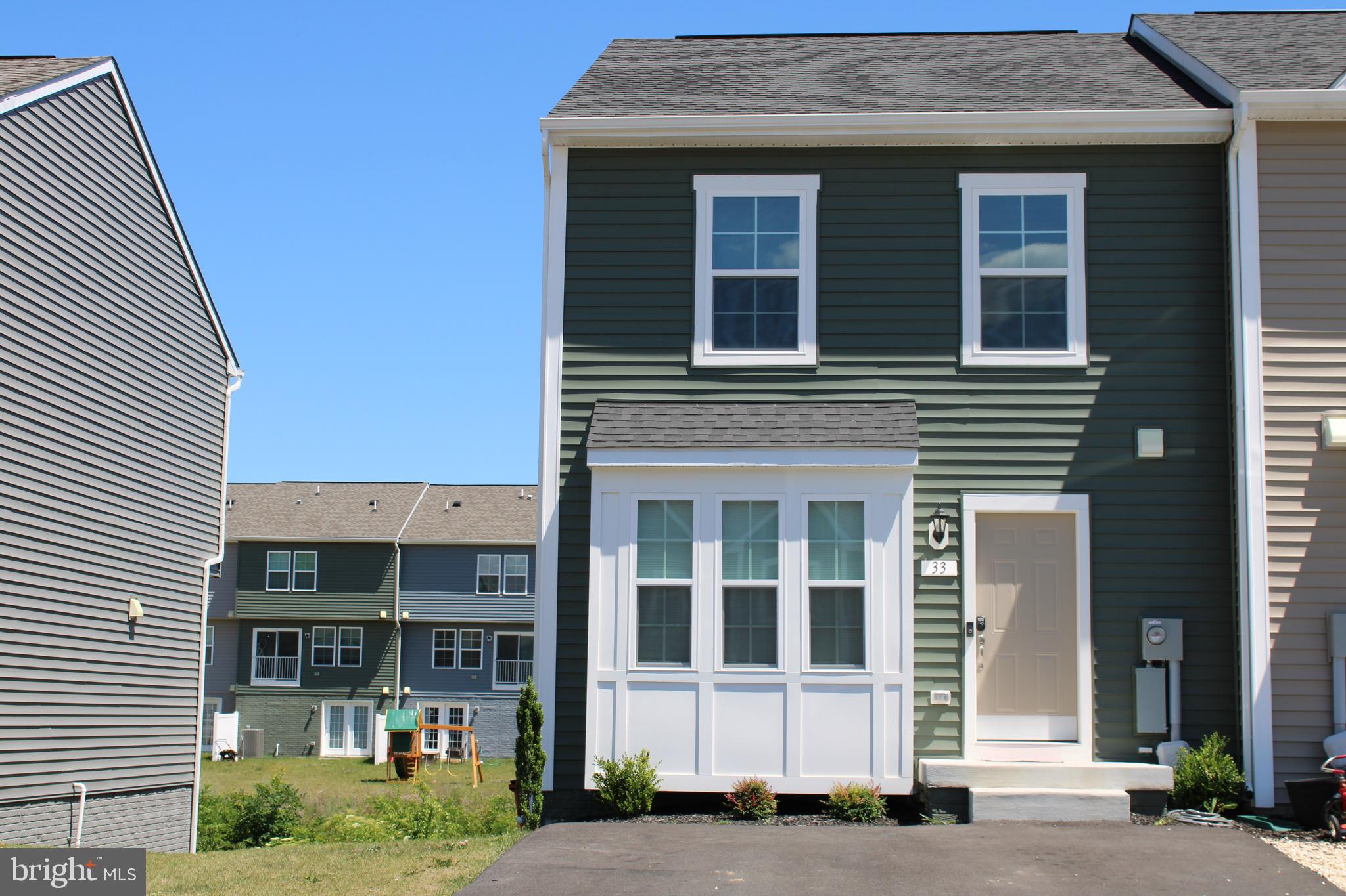 YOUR chance to own a  LIKE NEW END UNIT 3 LEVEL TOWN HOME .   ONE OF THE FEW TOWNHOMES WITH A FINISHED BASEMENT IN WHISPERING PINES.   Home features an open floor plan with LVP flooring 3 bedrooms and 3.5 bathrooms.  The finished basement has its own full bath , additional storage plus it is a  walk out to the back yard.  This townhome is not like others when it comes  to  parking; here you have an oversized paved driveway that easily can handle 4 normal size vehicles .   The location is ideal as its minutes from Inwood and Charlestown  and has quick access to the interstate making it a great commuter location.  All loan programs welcomed.