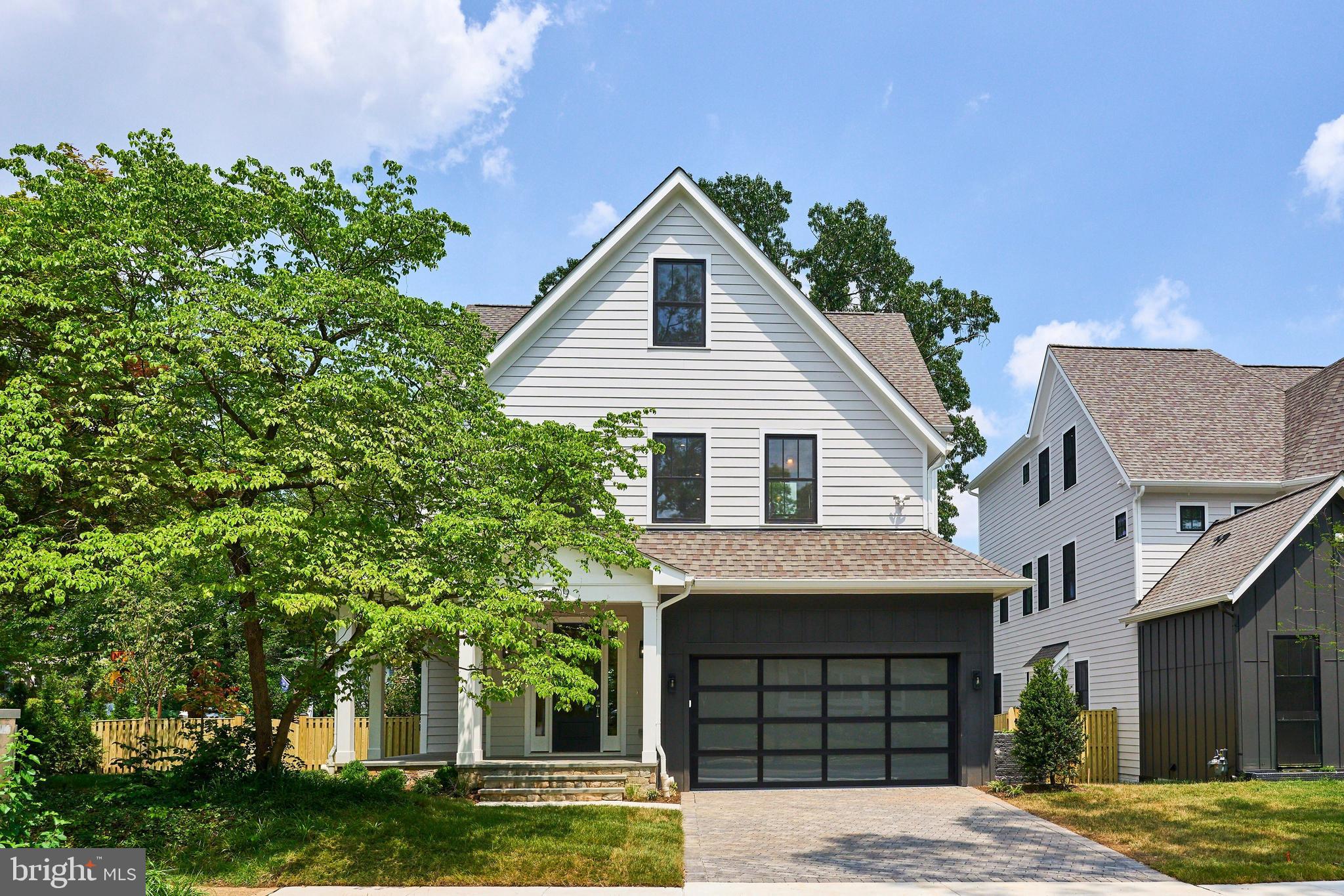 Stay tuned for an exceptional luxury craftsman style home coming to the market, in the heart of sought after Ashton Heights. This brand new construction designed by Steve Bukont and built by  Saffer Properties is refined luxury in a premier location; walkable, bikeable or a short car ride to a host of urban amenities including the Clarendon and VA Square Metros and the bustling orange line corridor. At 4,937 total SF (3,933 SF above grade, 1004 finished SF on the lower level) across four thoughtfully designed levels, this modern home features 7 bedrooms, 6 baths, blending timeless elegance with modern comfort.  The main level impresses with soaring 10-foot ceilings and exquisite wide-plank engineered hardwood flooring throughout. At the heart of the home, a stunning gourmet kitchen showcases sleek custom cabinetry, quartz countertops, a center island, Thermador appliances, and a seamless flow into the spacious family room, anchored by a floor to ceiling gas fireplace.   The main level is further enhanced by a spacious study, a custom mudroom with built-in cubbies, and a stylish powder room. Upstairs, the luxurious primary suite serves as a true retreat, complete with dual custom walk-in closets, and a spa-inspired bath featuring heated floors, dual vanities, a freestanding soaking tub, and an oversized glass-enclosed shower. The walk-out lower level is designed for both relaxation and recreation, offering a spacious entertainment room, and an additional bedroom with a full bath. The home also features gleaming engineered hardwood floors, custom molding, extra wide wood staircases, numerous walk-in closets, maintenance free Trex decking, lush landscaping, ample storage, 3 heating and cooling zones, and an oversized 2-car garage and paver driveway.   Priced at $547 per SF, what’s not to love? Delivery scheduled for this new build targeted for the end of June.  Zoned for Long Branch Elementary, Thomas Jefferson Middle School, Washington-Liberty High School.
