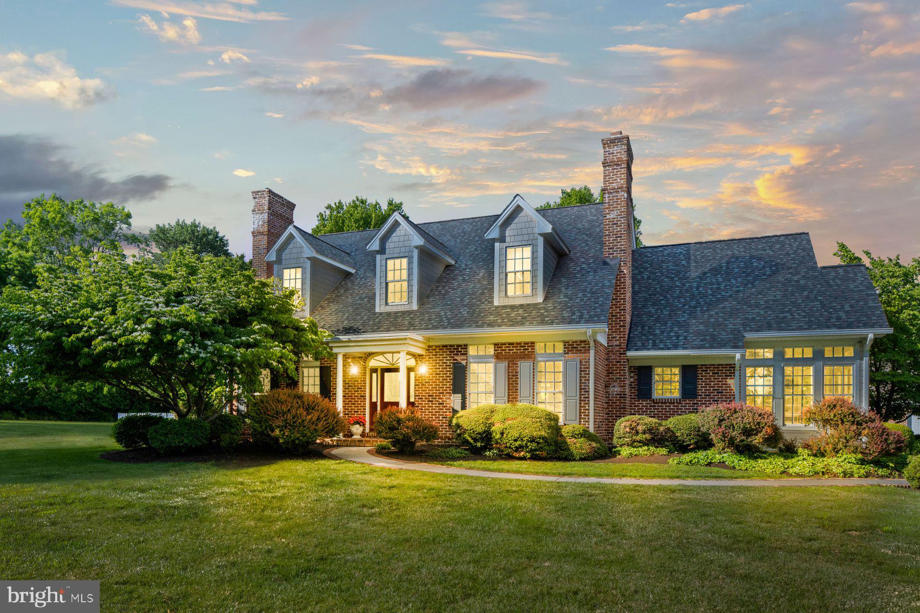 Offered publicly for the first time and nestled deep in the storied landscape of Oley Valley, this distinguished compound offers a blend of refined country living and modern convenience. Set on just under six acres of manicured privacy, the property is a private retreat with sweeping pastoral views, mature plantings, and a recently installed pool that invites summer gatherings and quiet afternoons alike.
 
The main residence is thoughtfully configured for today’s multigenerational lifestyles: a flexible 4–5 bedroom plan, 5.1 baths with four fireplaces includes a gracious main-floor primary suite. Interiors are bathed in natural light and anchored by generously scaled rooms perfect for both everyday living and formal entertaining. The recently renovated kitchen is a chef’s dream—top-tier appliances, abundant prep surfaces, and an intuitive flow to dining and outdoor living spaces make it the heart of the home. Upstairs hosts an additional 4 bedrooms and two full baths. Additional opportunity for a two-story in-law or au pair suite within the main home. A full basement and well-planned service areas provide storage and utility.
 
Automotive and entertaining aficionados will appreciate the impressive collection of garages: a 2-car attached garage for daily use, a 3 bay detached garage with parking for 12 and a home gym - great for projects or storage. That's not all, display your collection in the striking 3-door showcase garage—ideal for housing prized cars or your own personal event space with easy access to the newly added pool. 
 
Enjoy effortless access to the Lehigh Valley, King of Prussia and Philadelphia with convenient park‑and‑ride and regional rail options nearby make weekday commutes and city excursions simple and practical.
