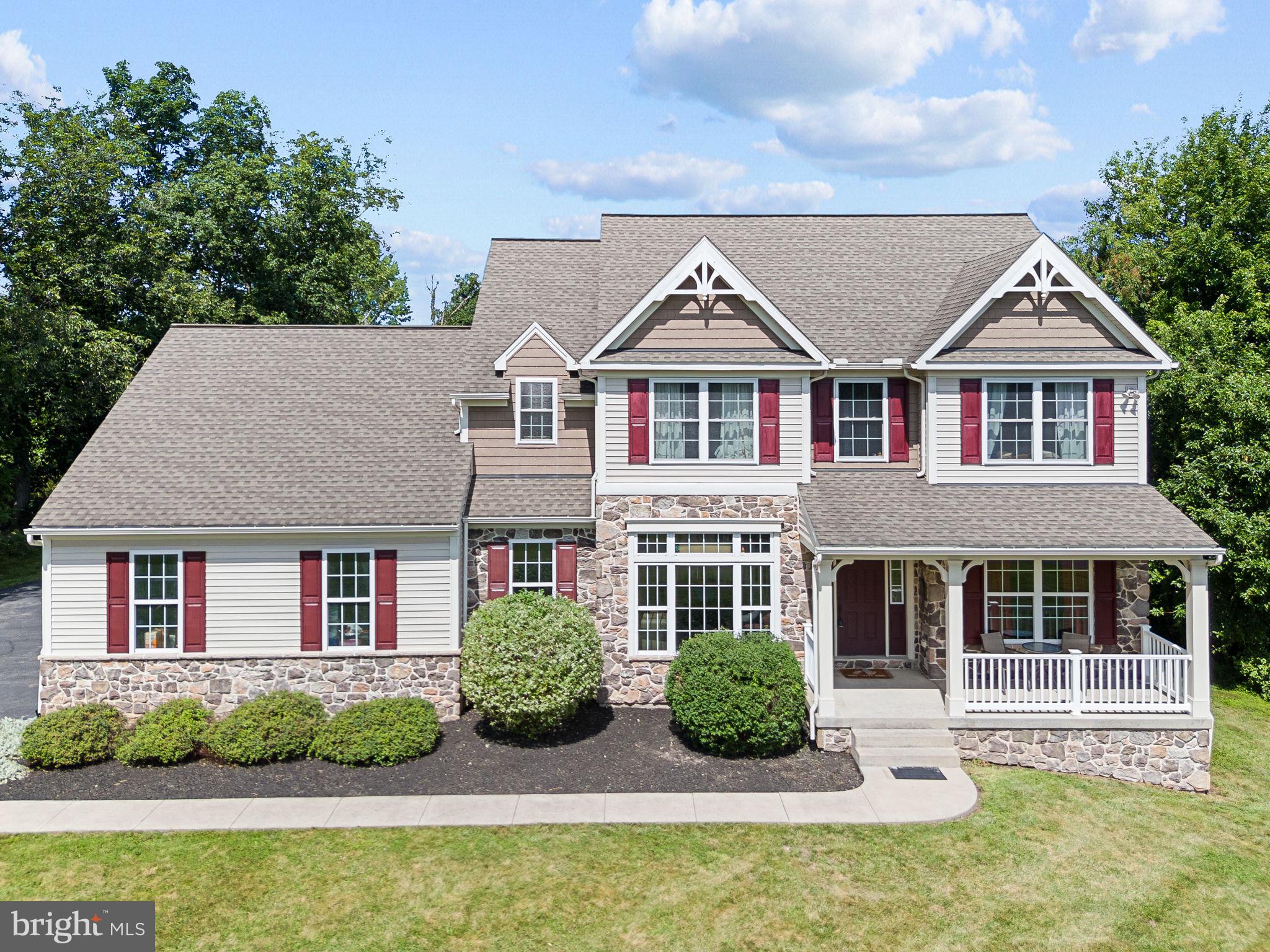Nestled on a secluded 1.5-acre lot in the highly sought-after Pennridge School District, this beautifully maintained 4-bedroom, 2.5-bath Colonial offers the perfect blend of space, comfort, and modern updates. A welcoming foyer with hardwood flooring sets the stage as you enter this inviting home. The open floor plan features a formal dining room and a versatile office or playroom just off the foyer, while the spacious living room showcases recessed lighting and a cozy propane fireplace, flowing seamlessly into the eat-in kitchen. The kitchen is designed for both everyday living and entertaining with white cabinetry, granite countertops, a center island, stainless steel appliances, and a pantry. The adjoining sunroom fills the home with an abundance of natural light and provides access through a sliding glass door to the composite deck, creating the perfect indoor-outdoor living space. Completing the main level are a convenient first-floor laundry/mudroom, a powder room, and access to the oversized 3-car garage. All carpet and vinyl flooring throughout the home is new. Upstairs, the spacious primary suite offers a relaxing retreat with tray ceilings, recessed lighting, a walk-in closet, and a private en suite bath featuring a soaking tub, double vanity, and a shower stale with a built-in seat. Three additional generously sized bedrooms each two include walk-in closets and share a well-appointed full hall bath. The full unfinished basement offers endless possibilities for future expansion with an egress window and plumbing already roughed in for an additional bathroom. Combining privacy, thoughtful design, and room to grow, this exceptional property is ready to welcome you home.