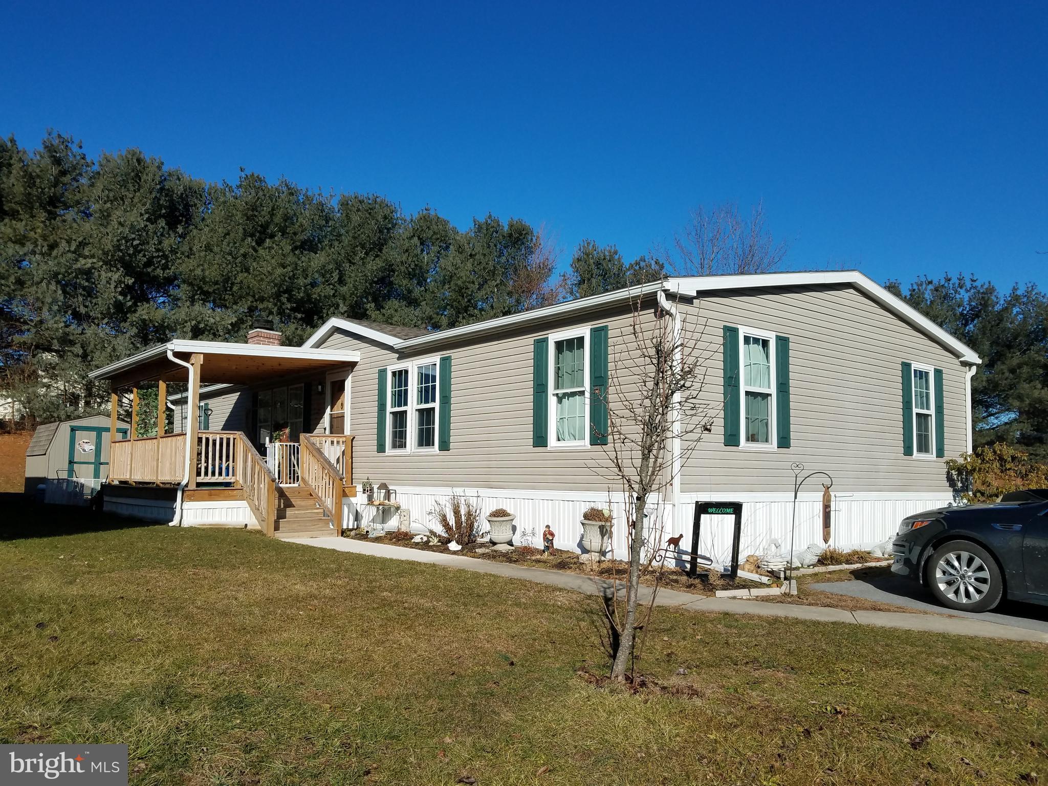 Welcome Home, in this 4 bedroom  newly renovated double wide, located in Country Side Village.  Enjoy the cold winter months around the wood burning fire place.  This home has a great deck for entertaining your guests and evening cook outs! Located in Shippensburg school dist.  Perfect for the commuter as well, easy access to 81.  Don't miss this opportunity There is a lot rent of $370 per month, and park approval will need to be obtained at time of offer.