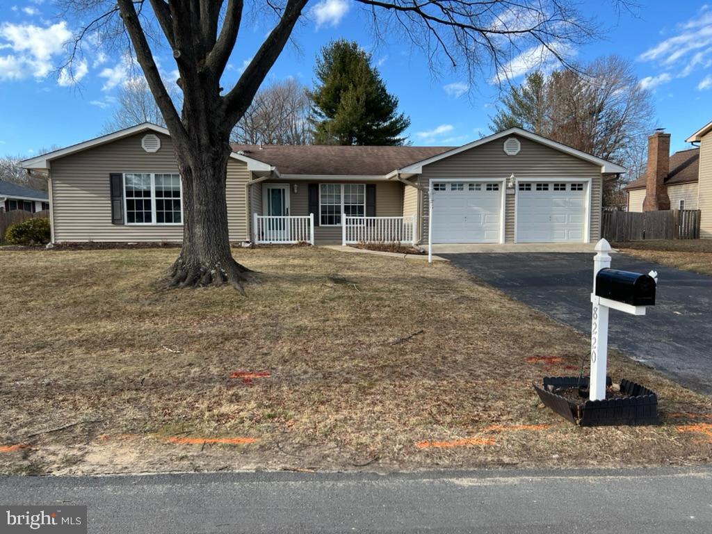 Beautiful and spacious ranch home with attached 2 car garage in New Cut Farms community.   Enjoy carefree living in this bright and sunny one level home.  Enter from the large front porch into the living room with fireplace.   The open concept kitchen/family room area has plenty of space to spread out.  There are tons of cabinets, corian counters,  wall oven, built in microwave and a cooktop.  There is a formal dining room, breakfast bar and table space for added dining areas.  The huge family room features a fireplace and slider to deck overlooking the large fenced in rear yard.   The primary bedroom has an ensuite full bathroom and walk in closet.  The other 2 bedrooms are spacious with plenty of closet space and access to the hallway full bathroom.   The oversized 2 car garage features shelving and a spacious storage/mud room with door leading to the kitchen.   Stacked washer and dryer along with a sanitary tub are located in a closet in kitchen.  Conveniently located near schools, shopping, restaurants, major highways for easy access to Annapolis, DC, Baltimore.
