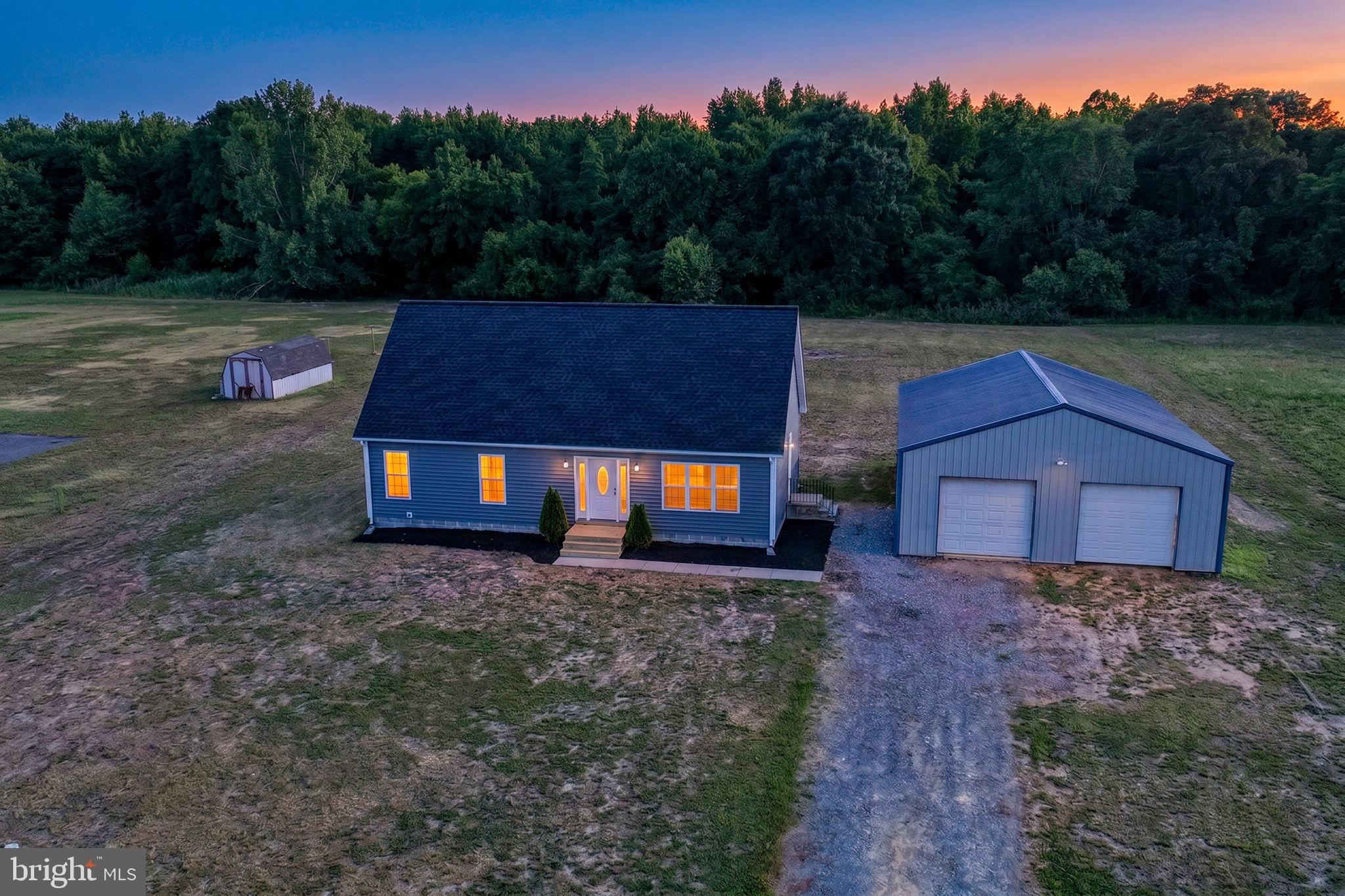 Welcome to Mallow Dr.!  Situated on 1.24 acres in a peaceful rural setting, this move-in ready 3-bedroom, 2-bath home offers the perfect combination of comfort, space, and recent upgrades.  Inside, you'll find approximately 1,650 square feet of living space featuring an updated kitchen and brand-new LVP flooring (2026), creating a fresh and modern feel throughout. Major improvements provide peace of mind, including a new roof (2022), new windows and siding (2025), and numerous updates that make this home truly turn-key.    Step outside and enjoy the spacious backyard from the rear deck, perfect for relaxing, entertaining, or taking in the surrounding countryside.  A standout feature of the property is the impressive 30' x 40' detached workshop with electric.   Please note: central HVAC serves the main level only; the upper level is not connected to the home's heating and cooling system.  With a large lot, modern updates, and plenty of room to work, play, and grow, all within walking distance of Lake Pinehurst, this Fowling Creek property is ready for its next owner. Schedule your showing today!