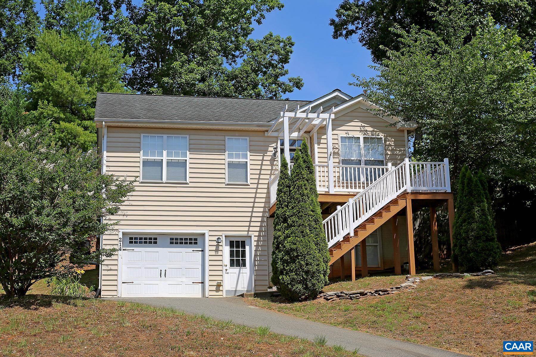 Move-in Ready! This dog-friendly 3 bedroom, 2 bath N. Albemarle home is located within the Camelot neighborhood and offers convenience to Rt. 29, NGIC, UVA's North Fork, the Charlottesville-Albemarle airport, and Hollymead Town Center. A nearby walking trail leads to the Rivanna River where you can enjoy swimming, fishing, and kayaking. Camelot is located 9.5-11 miles north of the UVA Grounds, Medical Center, and JAG school, as well as the downtown area of Charlottesville.  The 1,691 sqft home offers hardwood floors throughout the main living areas, carpeted bedrooms, a large fenced backyard, and an attached 1-car garage.  The main level of the home includes an open living room and eat-in kitchen, a primary bedrom with a walk-in closet and en-suite full bath, plus two additional bedrooms that share a hall bath, and the laundry room (appliances included). The lower level includes a family room/4th bedroom option with a walk-in closet, and an additional room which would work well as a home office.   Rent includes: lawn care. One dog (50lbs max) is allowed with additional fees. No cats.