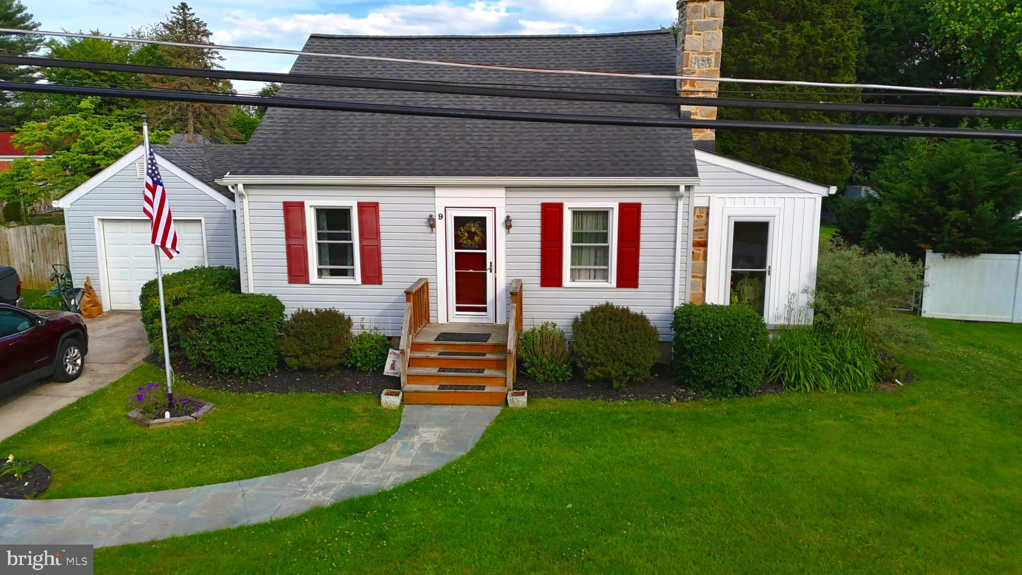 Tucked away on a quiet dead-end street, this thoughtfully updated Reisterstown home offers the perfect blend of character, comfort, and modern upgrades throughout. From the moment you arrive, the lush, mature landscaping sets a welcoming tone that carries through every corner of the property.
The main level impresses with two generously sized bedrooms, a large living room anchored by a stunning stone fireplace, and a beautifully renovated eat-in kitchen featuring brand new granite countertops and cabinetry. The updated full bathroom is a standout feature, showcasing a large tiled walk-in shower that adds a touch of spa-like luxury to the everyday routine. Just off the living room, a side addition sun room and reading nook offers a quiet retreat — ideal as a home office, reading escape, or relaxed sitting area. New flooring, windows, and roof round out the list of improvements, giving buyers true peace of mind from day one.
The entire top floor serves as a private third bedroom suite — a versatile and expansive space that lends itself beautifully to a combined bedroom and home office setup, offering both privacy and functionality.
Downstairs, the soundproofed basement is one of the home's most unique and exciting features. Originally built out as a professional jam space by the home's musician owner, the open-concept lower level offers exceptional potential for a media room, entertainment space, home studio, or recreation area — a truly rare find.
Step outside to a backyard that feels like a private nature retreat. A large deck sets the stage for entertaining or quiet mornings with coffee, while two oversized storage sheds, a mature garden bed perfect for growing your own produce, and an expansive yard give you room to spread out and enjoy the seasons. The attached one-car garage and three-car driveway offer ample parking and storage for all your vehicles, equipment, and toys.
With every major system updated and a layout that offers flexibility at every level, this home is ready for its next chapter.